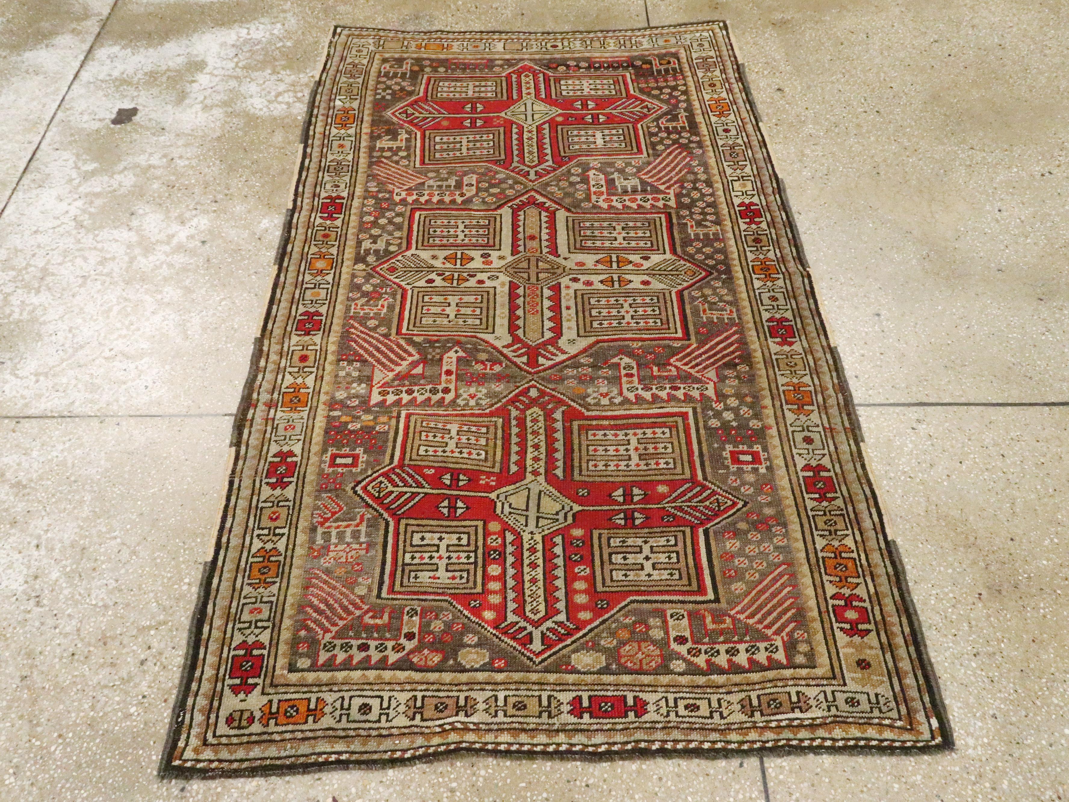 Hand-Knotted Small Handmade Caucasian Tribal Rug In Shades of Grey-Brown and Red