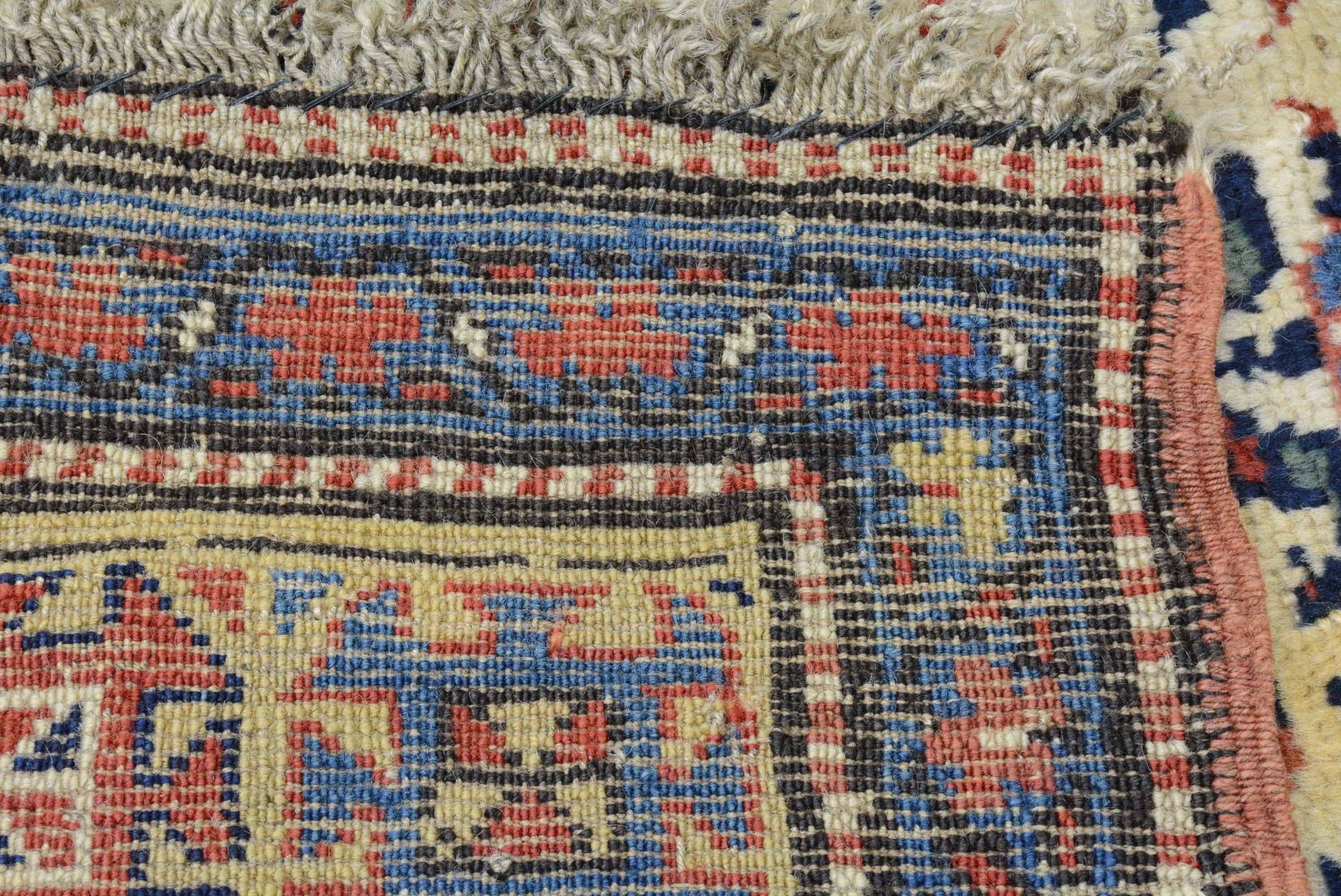 Laine Ancien tapis caucasien Kazak en vente