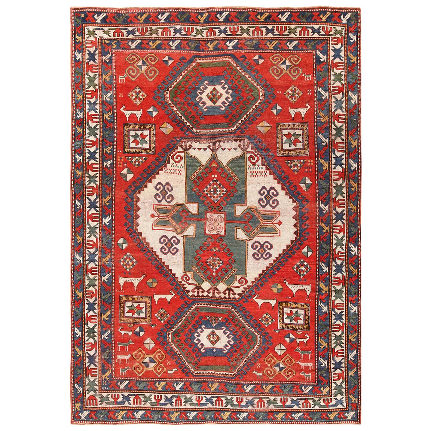 Tribal Antique Caucasian Kazak Rug. Size: 6 ft 7 in x 9 ft 2 in