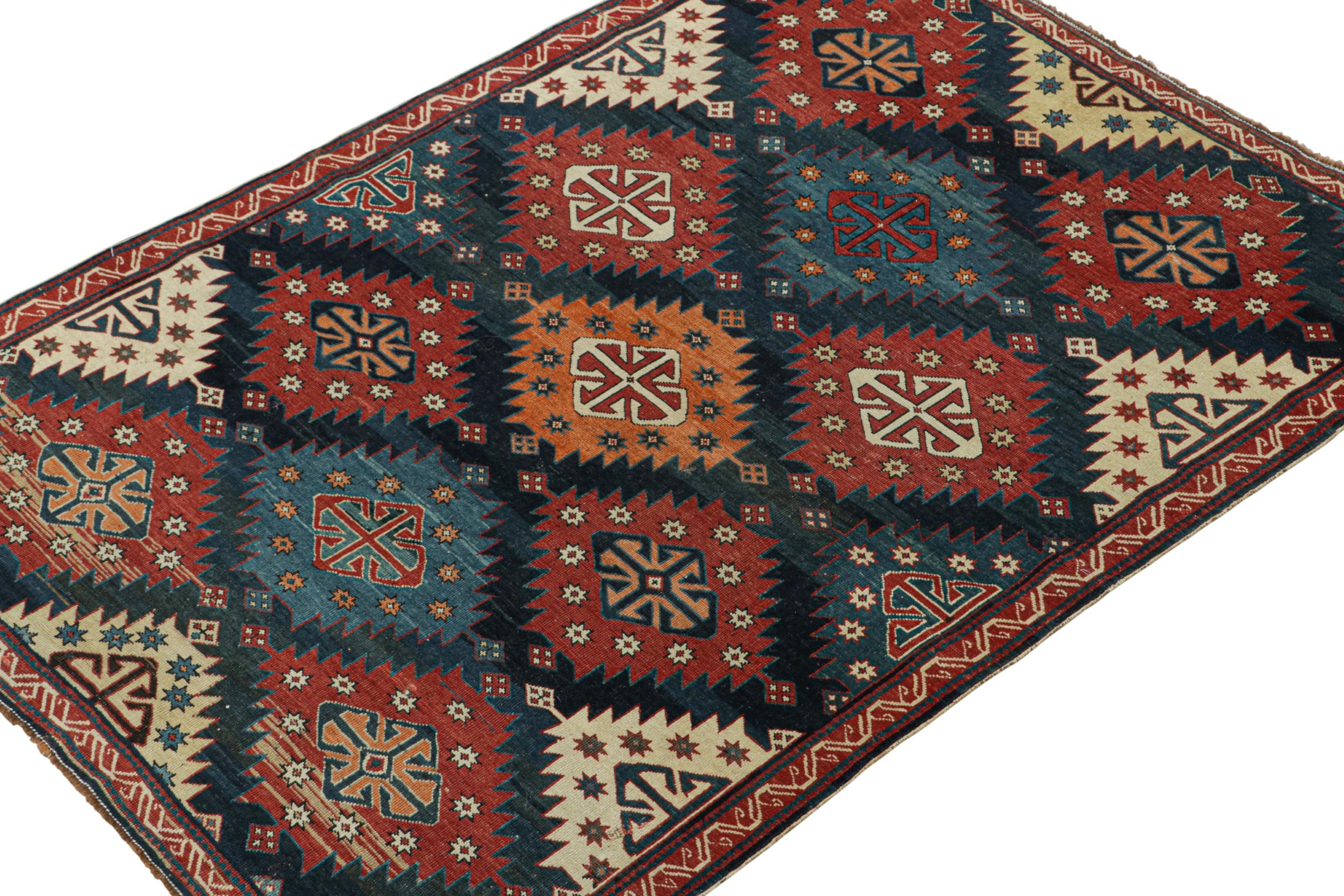 Hand-Knotted Antique Caucasian Kazak Rug in Red & Blue Tribal Patterns from Rug & Kilim For Sale