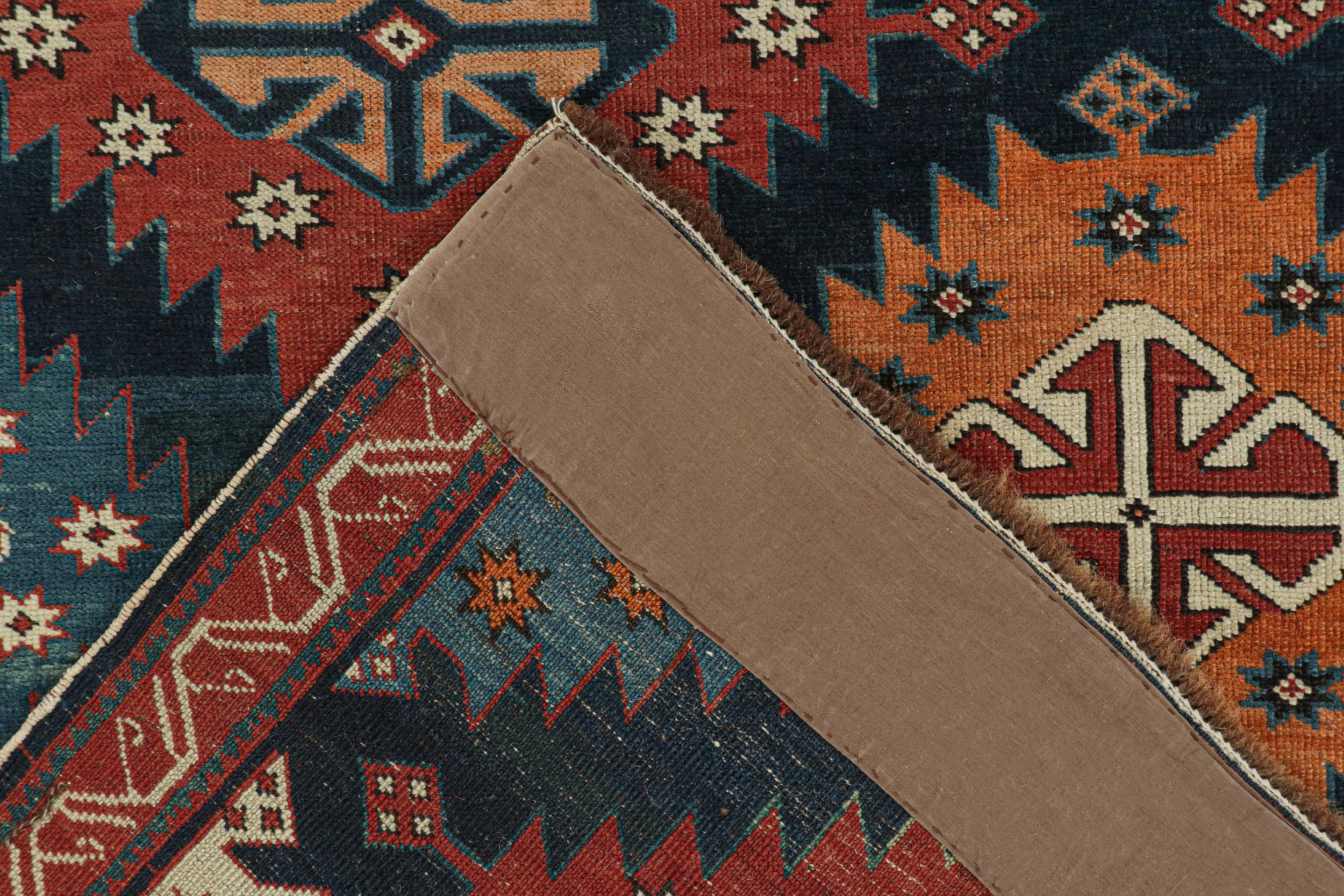 Wool Antique Caucasian Kazak Rug in Red & Blue Tribal Patterns from Rug & Kilim For Sale