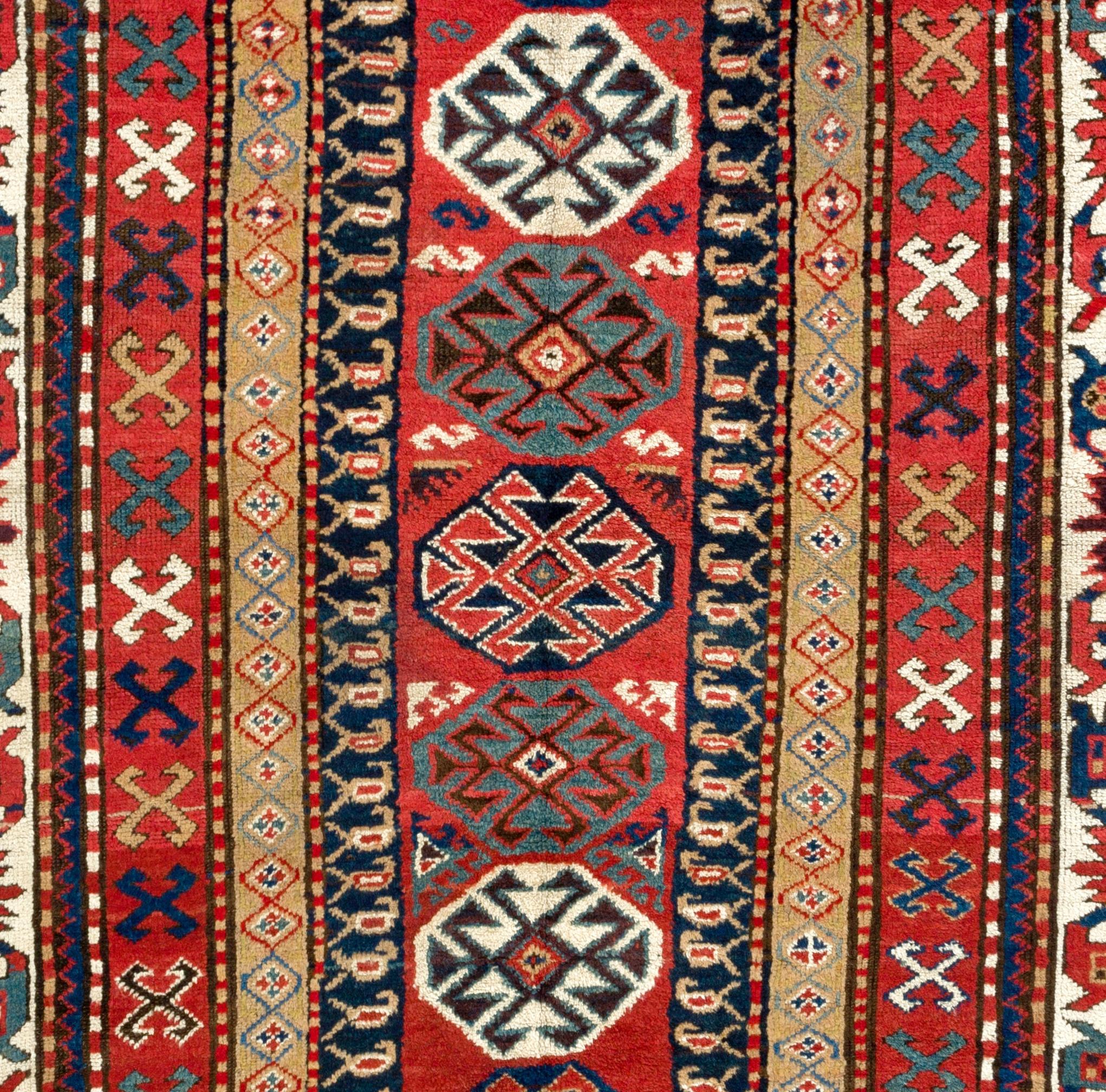 Antique Caucasian Kazak rug, circa 1870. Excellent original condition. Sturdy and as clean as a brand new rug (deep washed professionally).
DIMENSIONS: 5'3'' x 8'3'' (158 x 251 cm)