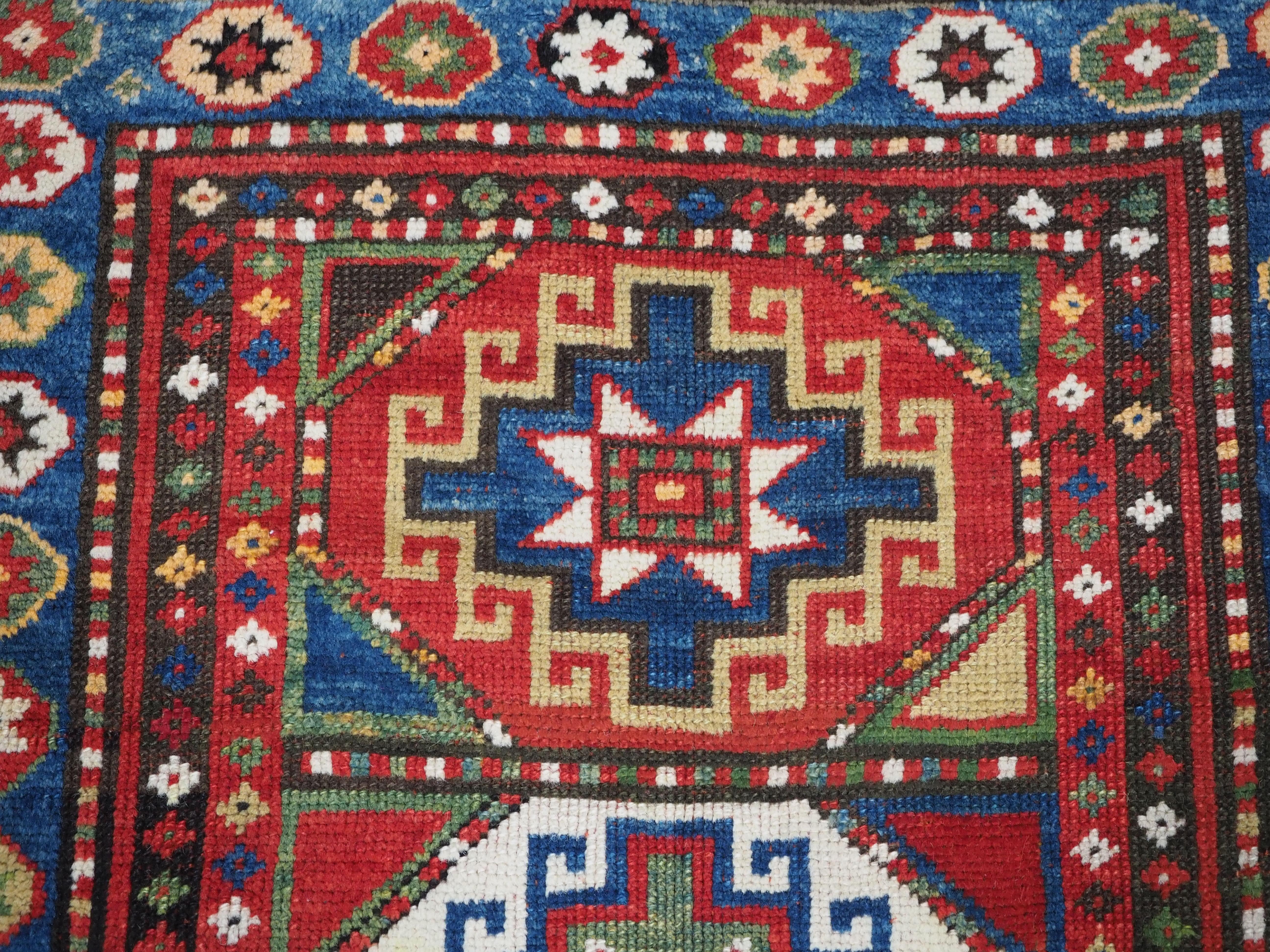 Antique Caucasian Kazak rug with a single column of boxed 'Memlinc guls'. For Sale 3