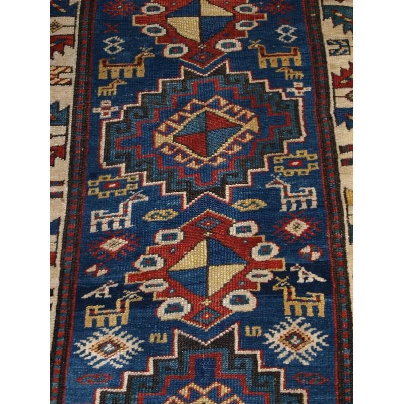 19th Century Antique Caucasian Kazak Rug with Bold Animal Design