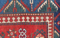 Antique Caucasian Kazak Rug with Bold Geometric Medallions 5'9 x 7'1