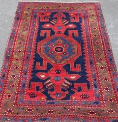 Antique Caucasian Kazak Rug with Bold Geometric Tribal Medallion Design