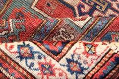 Antique Caucasian Kazak Rug with Brick Red Field and Bold Tribal Medallions