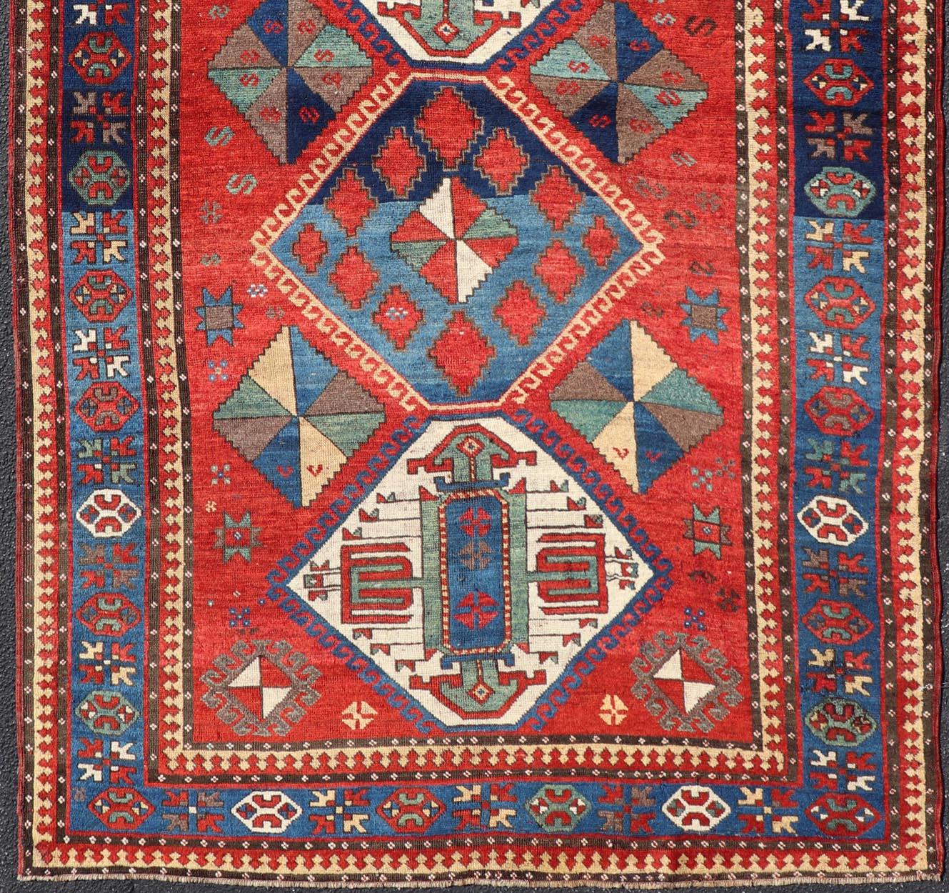 Antique Caucasian Kazak Rug with Four Bold Medallions on Red Field 5'2 x 9'1 In Good Condition For Sale In Atlanta, GA