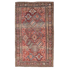 Antiker kaukasischer Kazak-Teppich mit geometrischem Design und Stammesmotiven 
