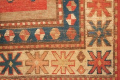 Antique Caucasian Kazak Rug with Repeating Geometric Devices