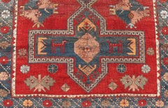 Tapis kazak caucasien ancien à motifs de grands médaillons tribaux subgéométriques