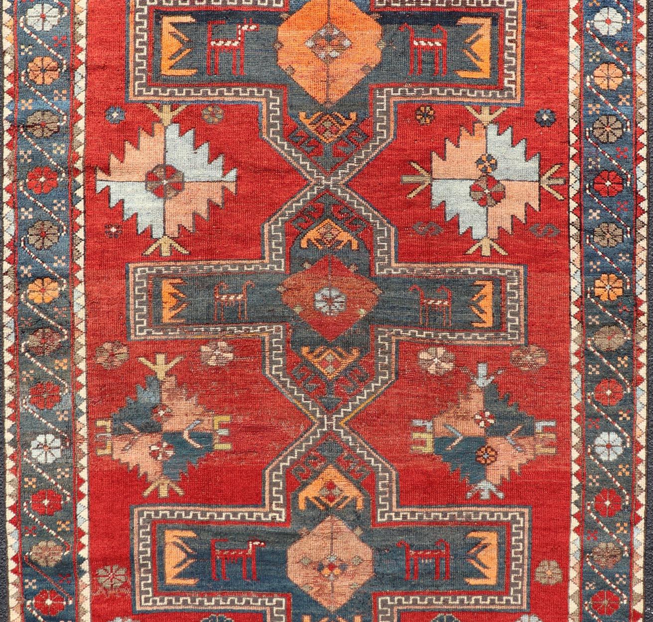 Wool Antique Caucasian Kazak Rug with Sub-Geometric Large Tribal Medallions Design