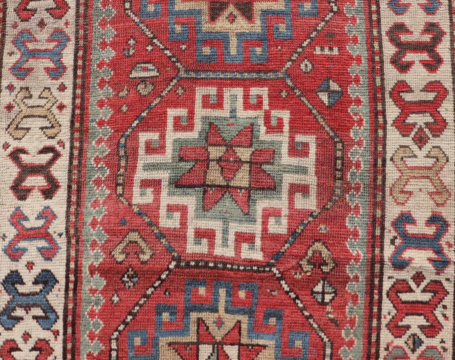 Hand-Knotted Antique Caucasian Kazak Rug with Sub-Geometric Medallion's Design For Sale
