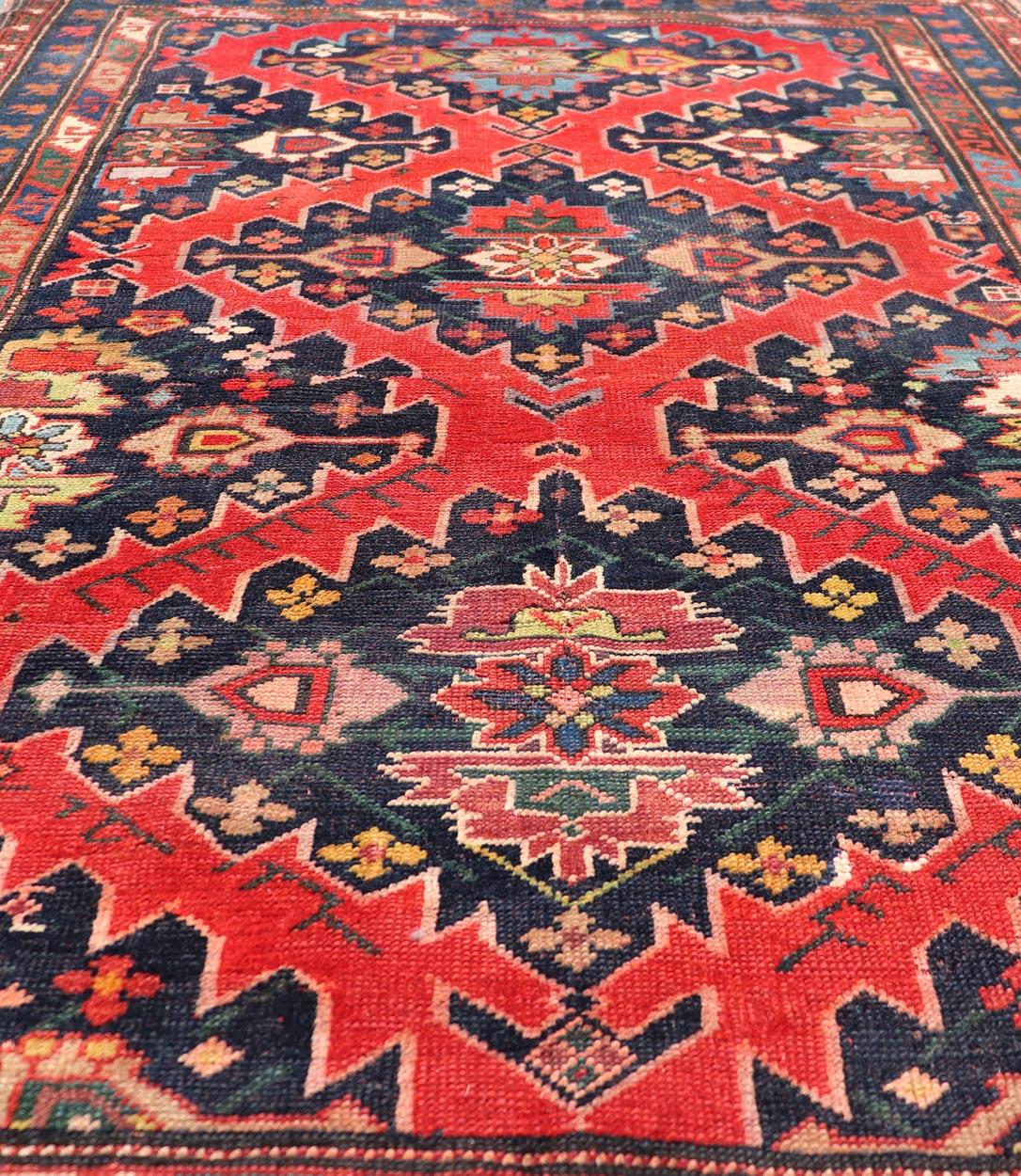 Hand-Knotted Antique Caucasian Kazak Rug with Sub-Geometric Medallions Design in Red and Blue For Sale
