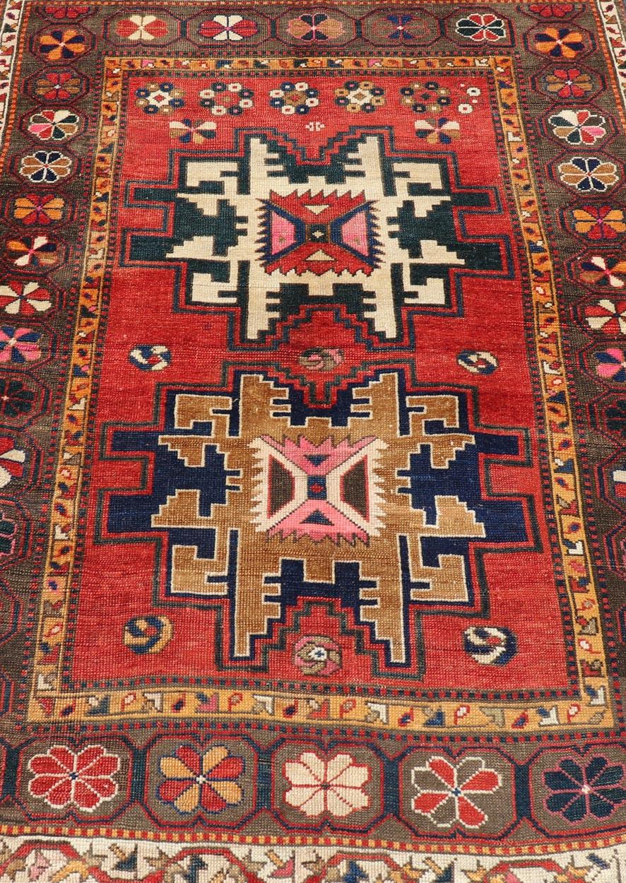 Hand-Knotted Antique Caucasian Kazak Rug with Sub-Geometric Star Medallions Design For Sale