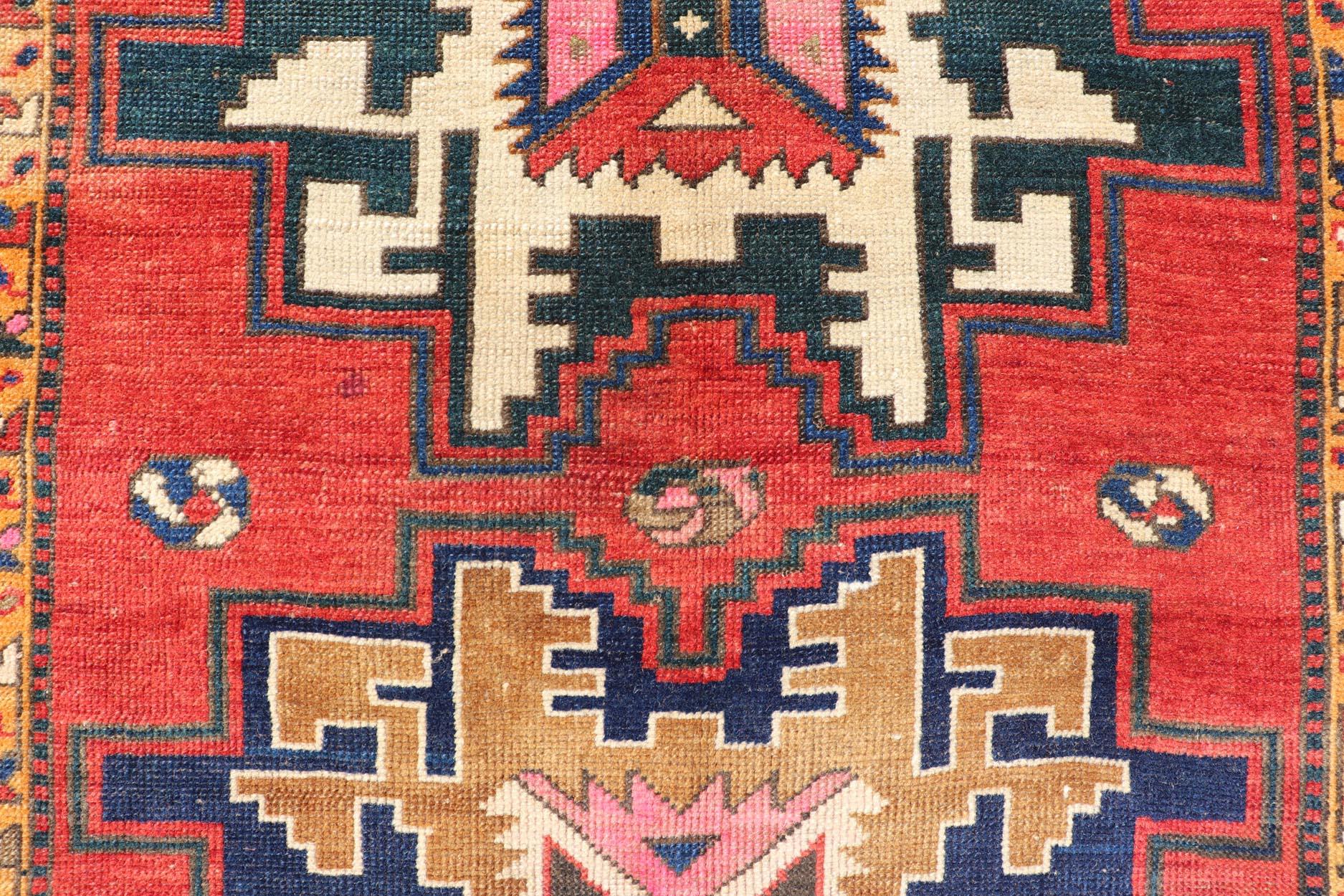 20th Century Antique Caucasian Kazak Rug with Sub-Geometric Star Medallions Design For Sale