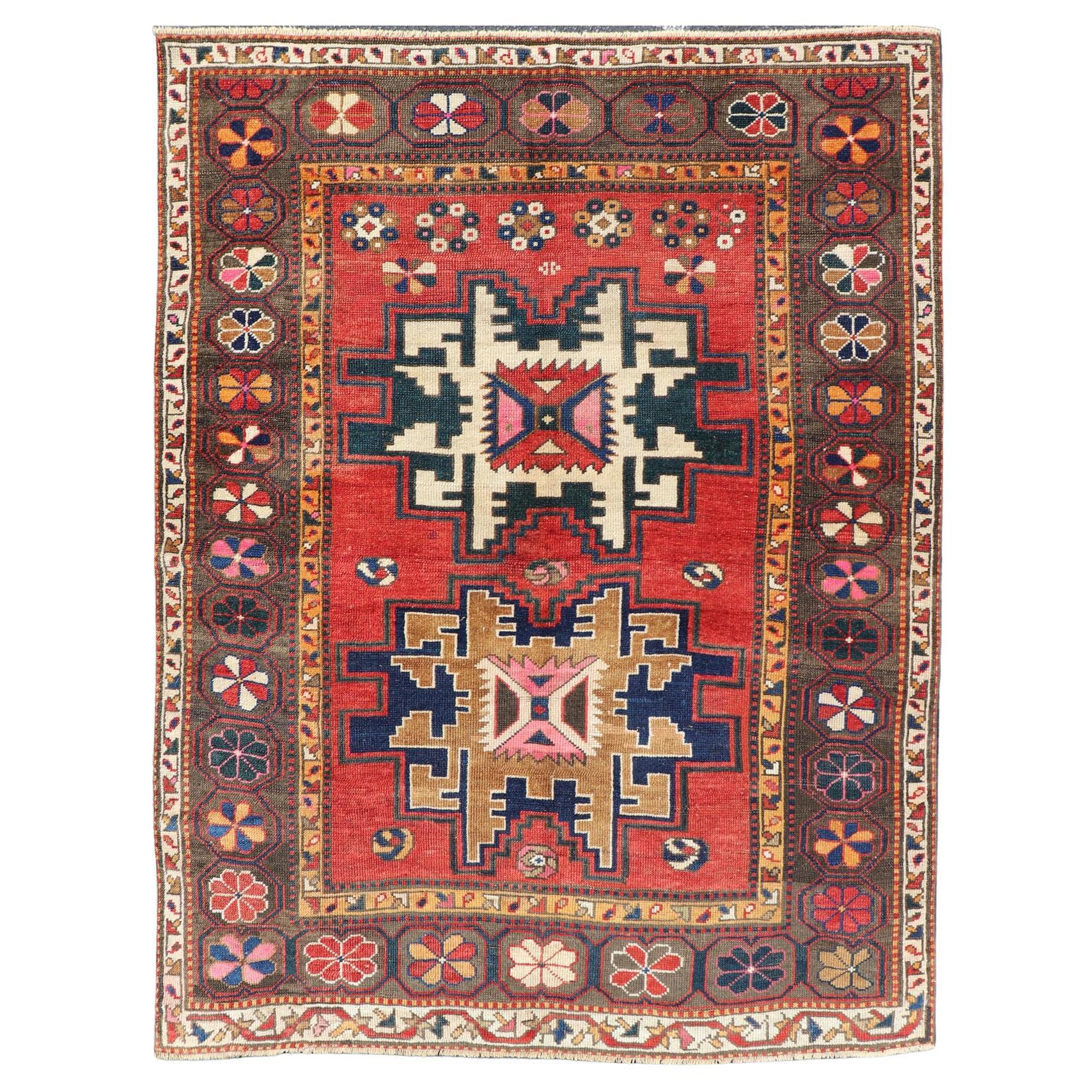 Antique Caucasian Kazak Rug with Sub-Geometric Star Medallions Design