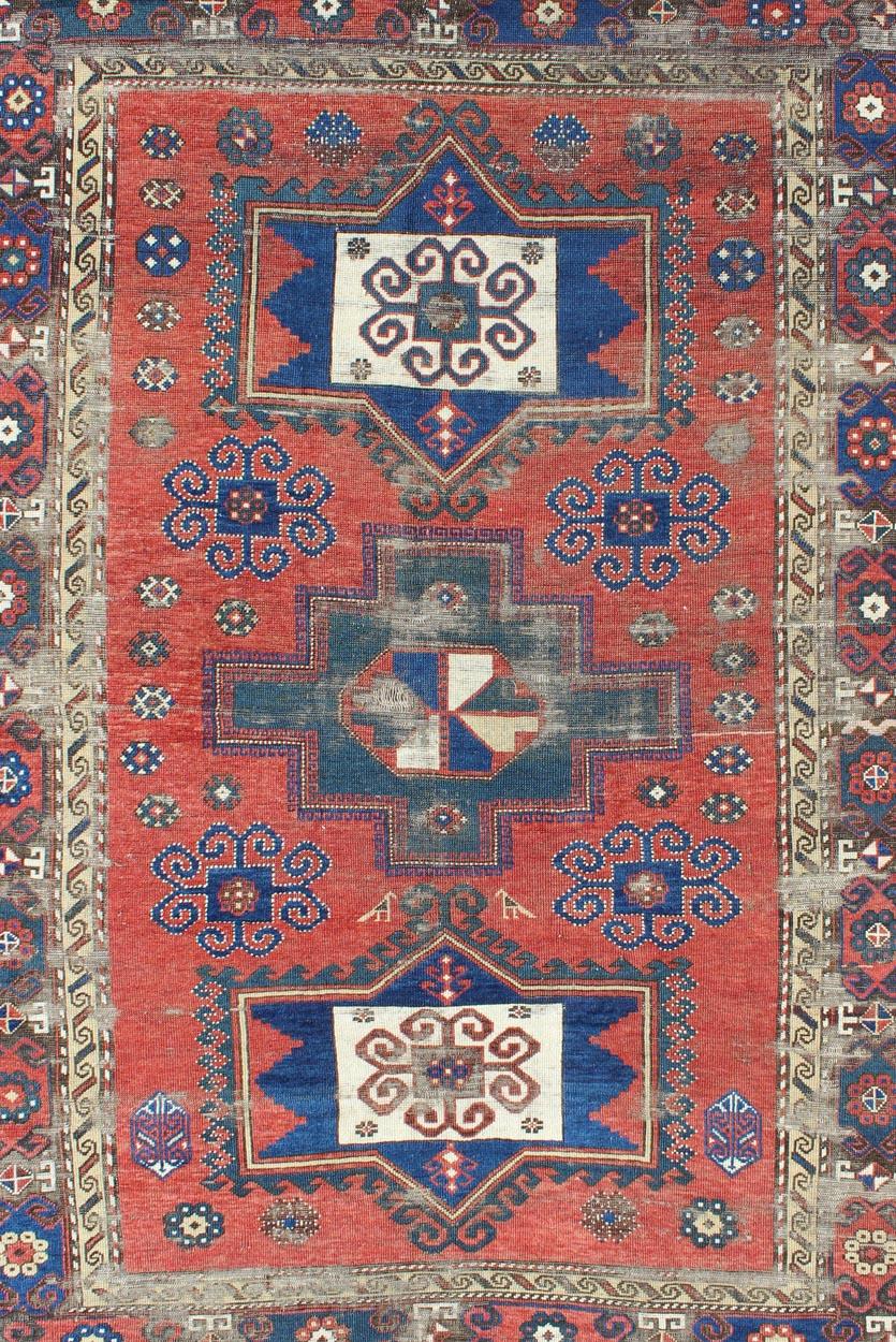 Hand-Knotted Antique Caucasian Kazak Rug with Tri-Medallion Geometric Design in Red and Blue
