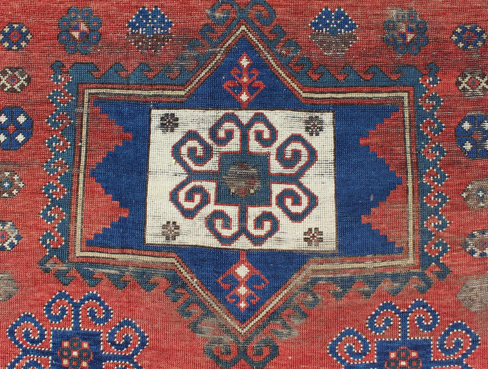 Antique Caucasian Kazak Rug with Tri-Medallion Geometric Design in Red and Blue 1