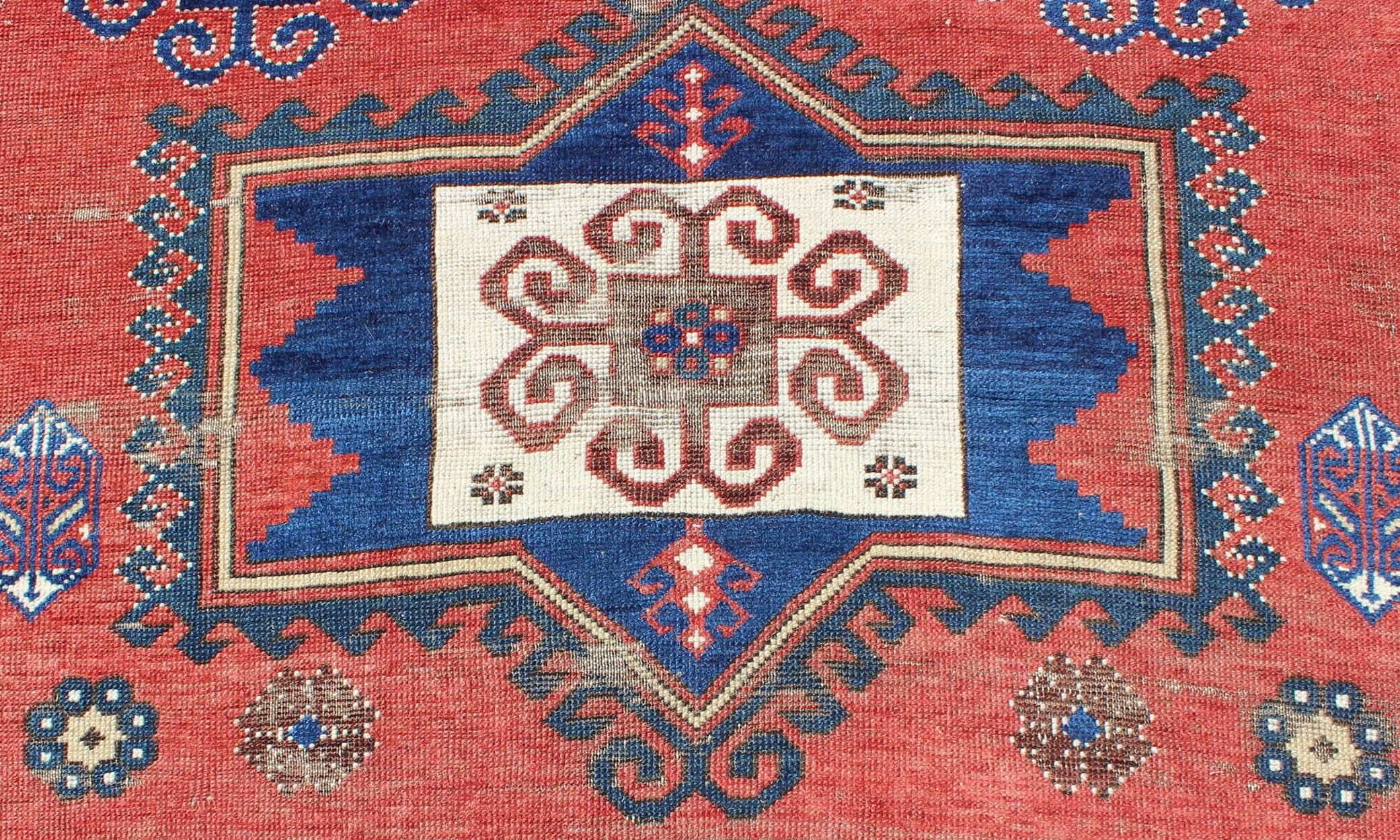 Antique Caucasian Kazak Rug with Tri-Medallion Geometric Design in Red and Blue 2