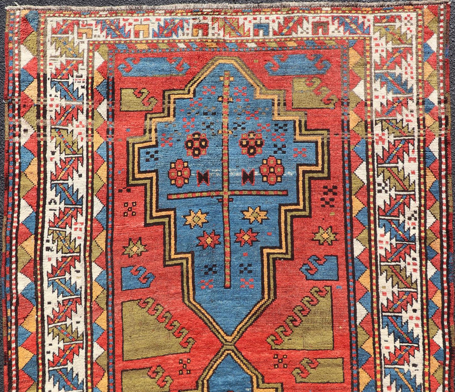 Hand-Knotted Antique Caucasian Kazak Rug with Tribal Geometric Medallion in Vivid Colors