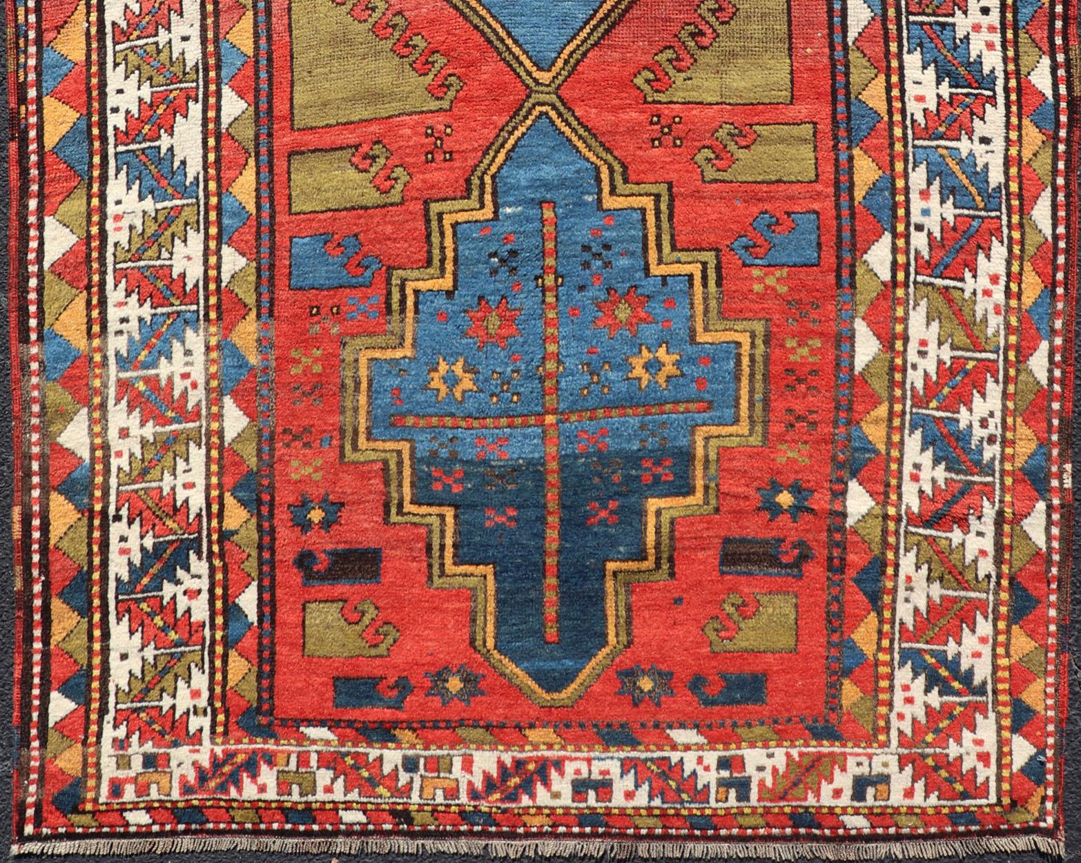 20th Century Antique Caucasian Kazak Rug with Tribal Geometric Medallion in Vivid Colors