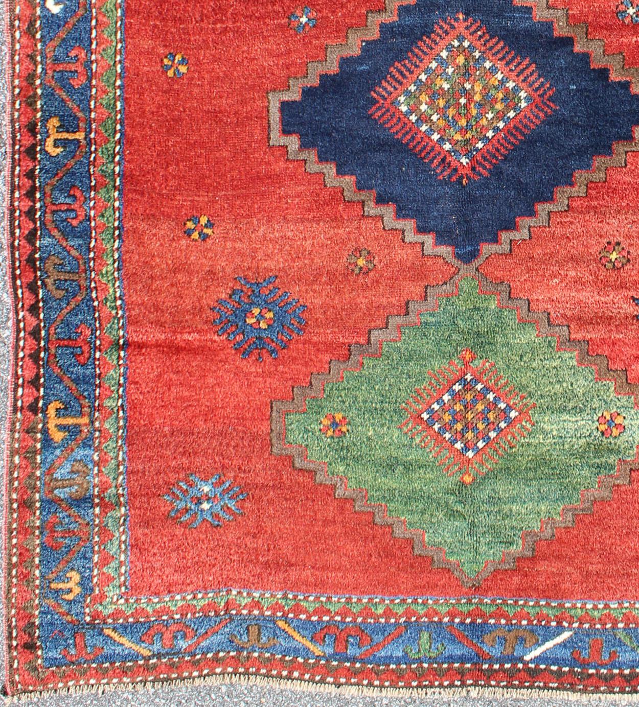 Hand-Knotted Antique Caucasian Kazak Rug with Tribal Geometric Tri-Medallions