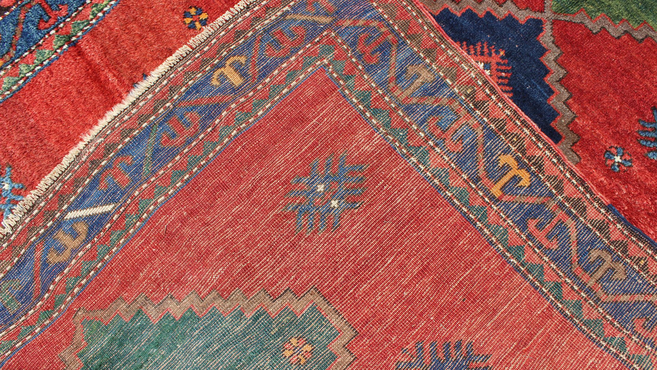 Wool Antique Caucasian Kazak Rug with Tribal Geometric Tri-Medallions