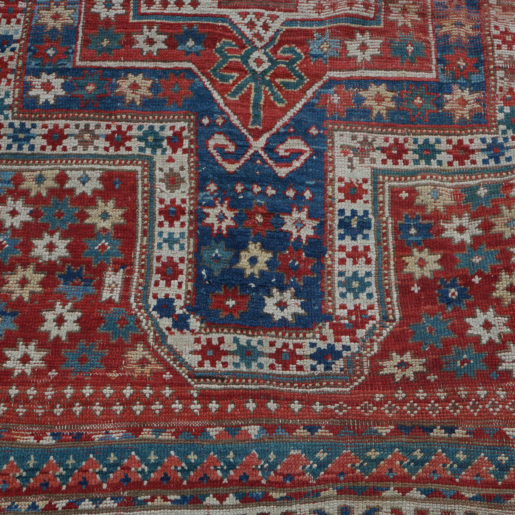 Wool Antique Caucasian Kazak Sewan Oriental Rug, Centre Medallion & Rams Horns, C1890