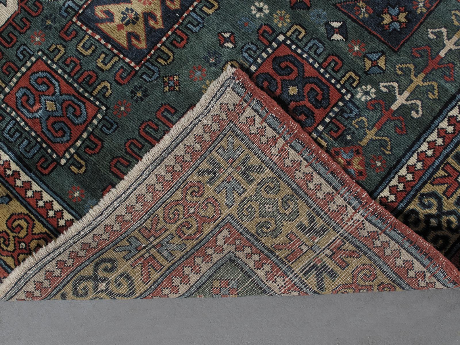 Early 20th Century Antique Caucasian Kazak Tribal Rug For Sale