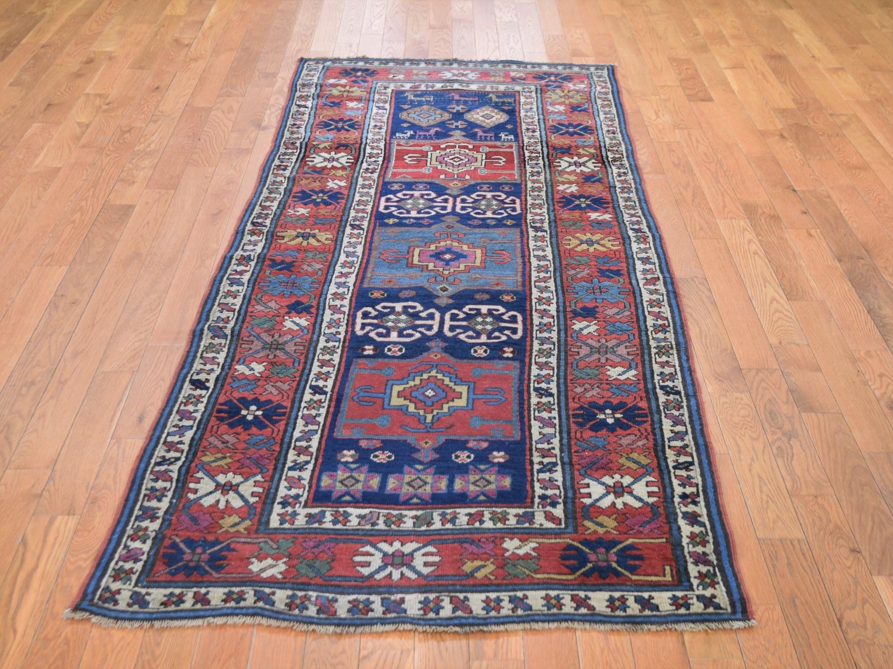This is a truly genuine one-of-a-kind antique Caucasian Kazak with eggplant color exc condition wide runner rug. It has been knotted for months and months in the centuries-old Persian weaving craftsmanship techniques by expert artisans.

Primary