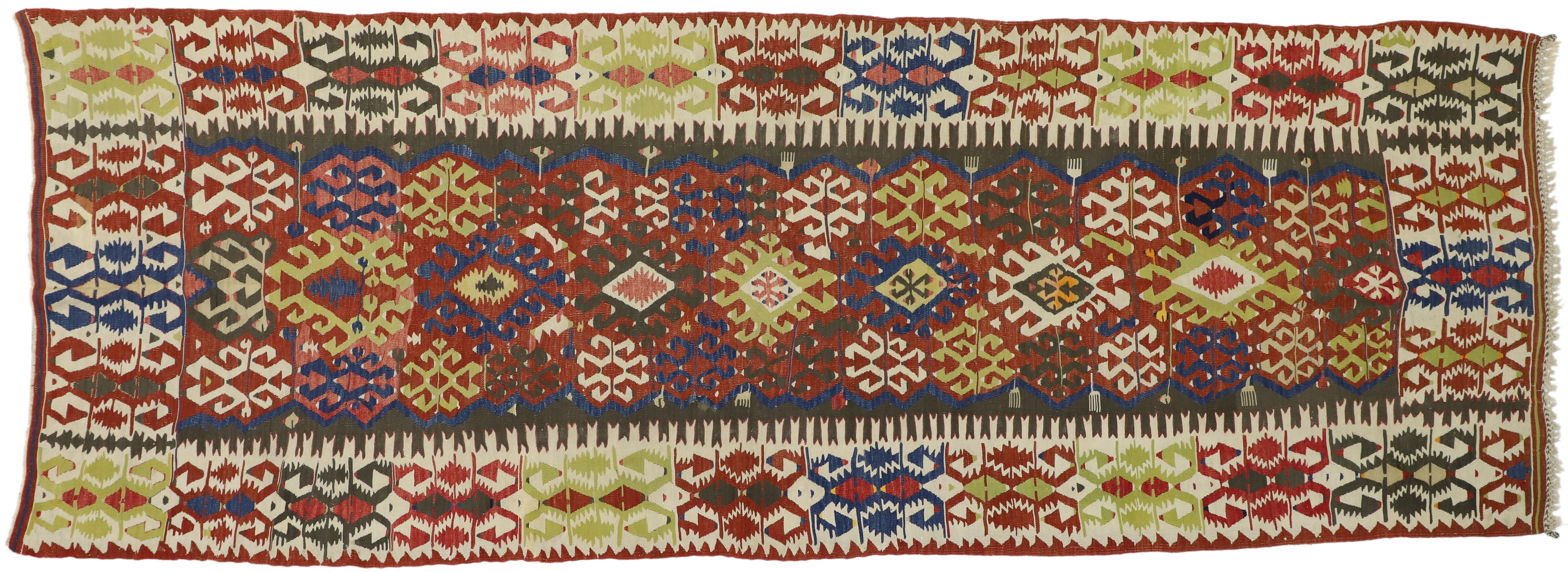 73271, antique Caucasian Kilim runner with Tribal style. This handwoven wool antique Caucasian Kilim runner with Tribal style is anything but boring. It features an all-over geometric pattern composed of ancient tribal symbols: Ram's Horn,