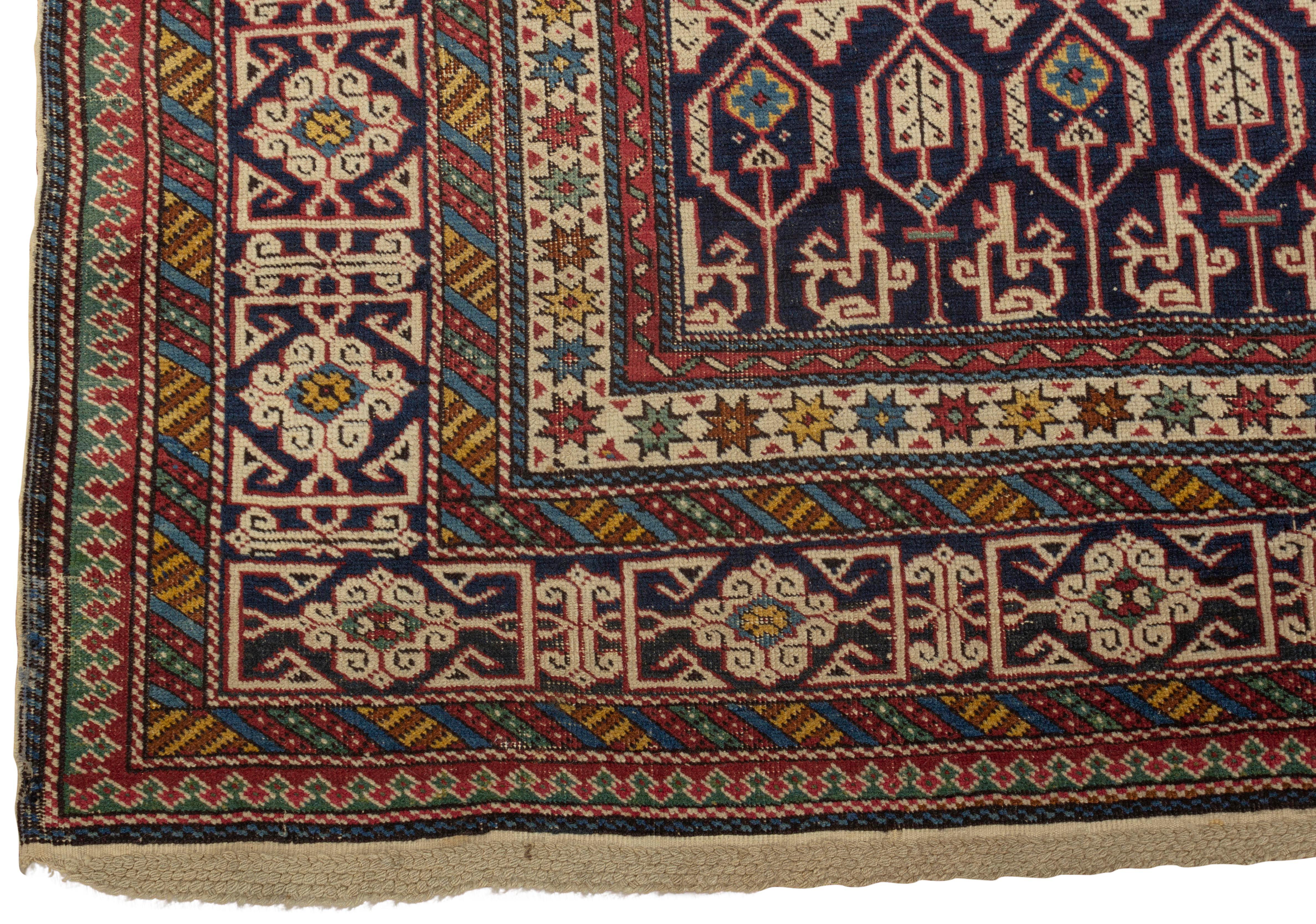Antique Caucasian Konagkend Kuba rug, circa 1890. Konagkend is about 20 miles south of Kuba in the Caucasus Mountains, between Persia and Russia and are justly famous for their scatter rugs and this is a fine example, the central navy field filled