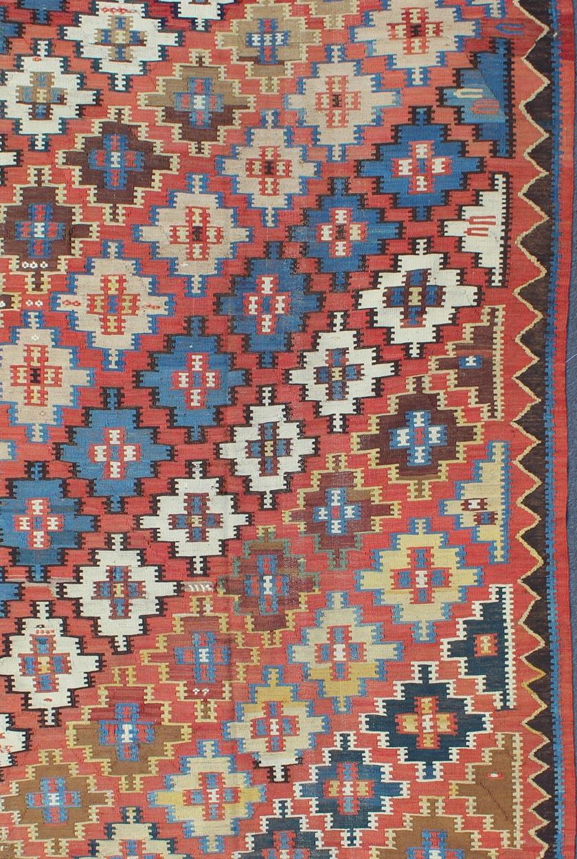 Hand-Knotted Antique Caucasian Kuba Kilim with All-Over Diamond Design in Rust & Blue Colors For Sale