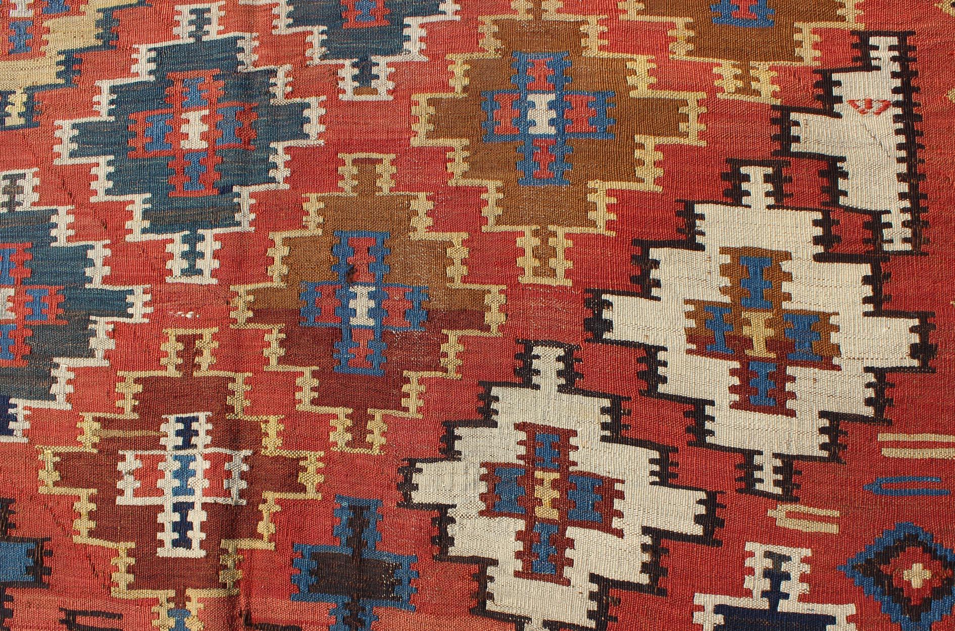 Wool Antique Caucasian Kuba Kilim with All-Over Diamond Design in Rust & Blue Colors For Sale