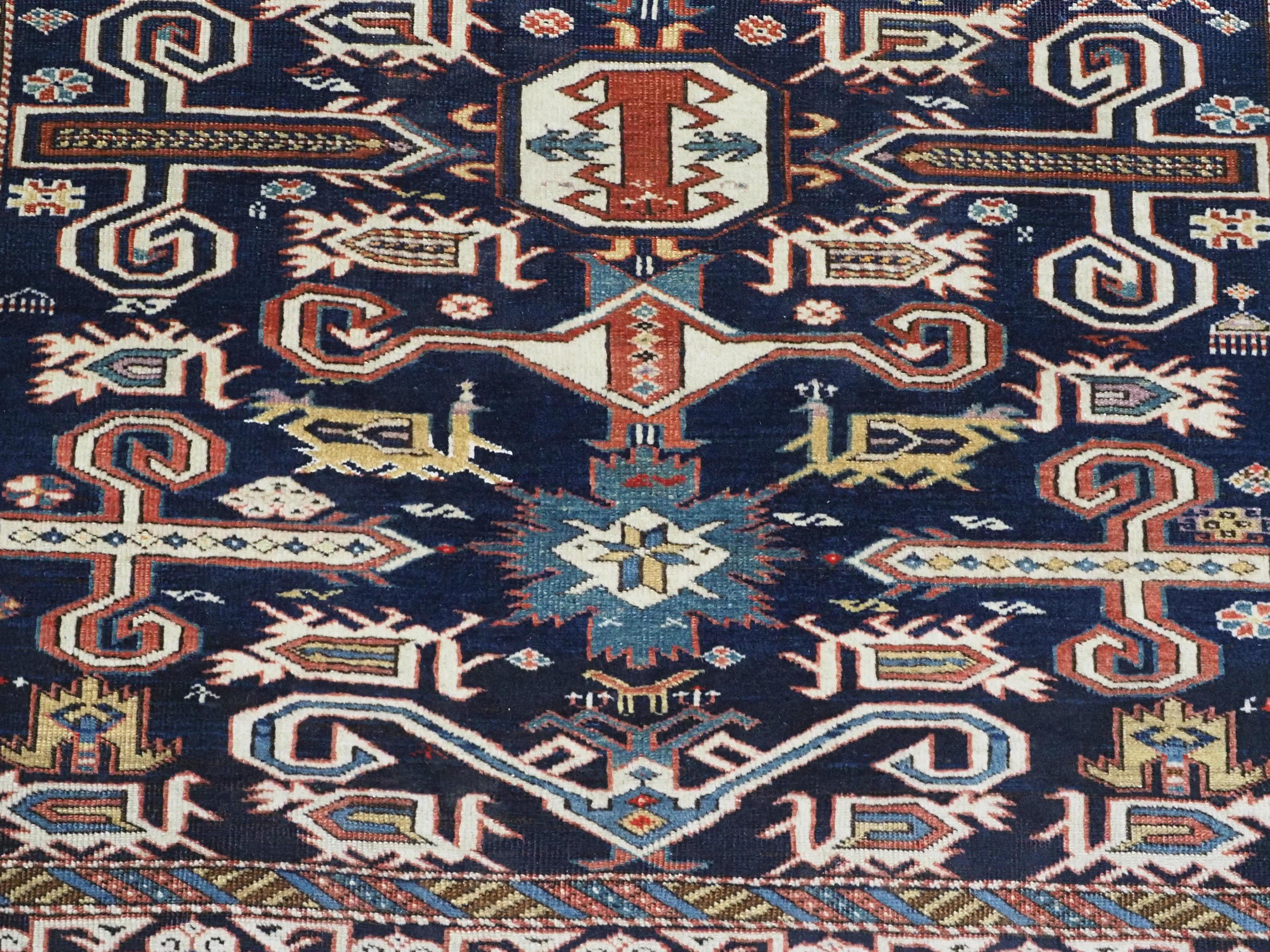 Antique Caucasian Kuba region Perepedil rug with an indigo blue ground. For Sale 5