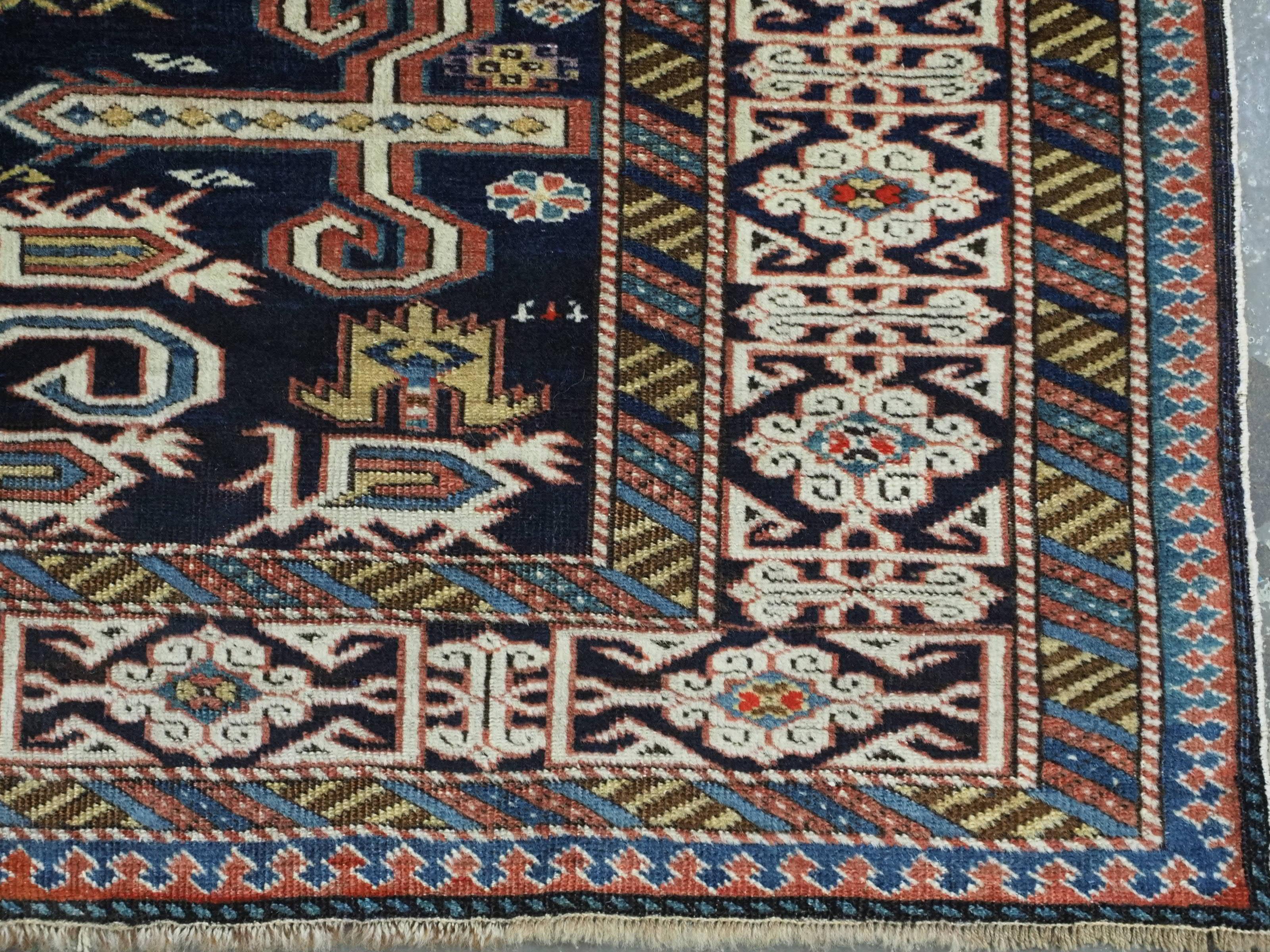 Antique Caucasian Kuba region Perepedil rug with an indigo blue ground. For Sale 6