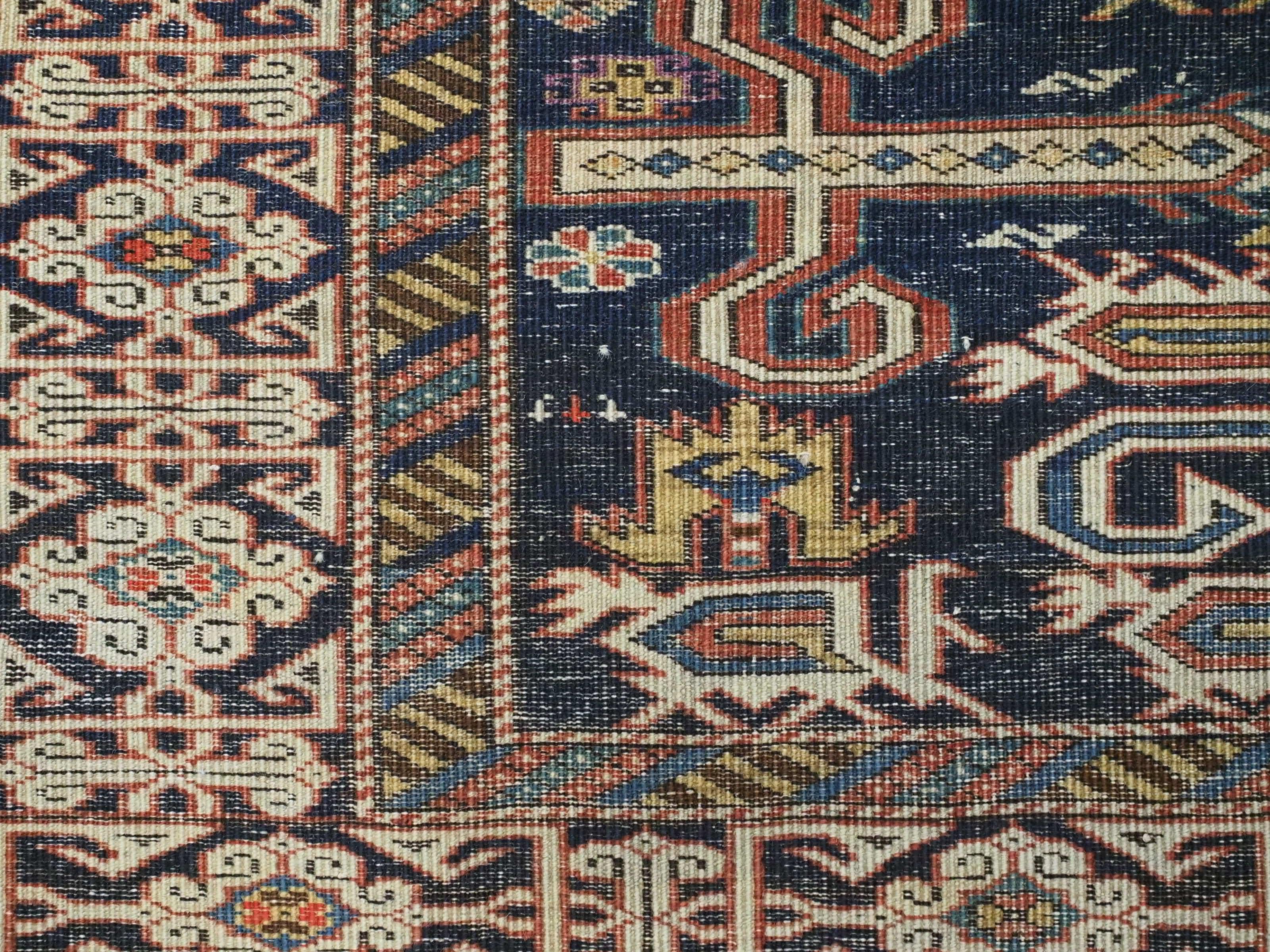 Antique Caucasian Kuba region Perepedil rug with an indigo blue ground. For Sale 7