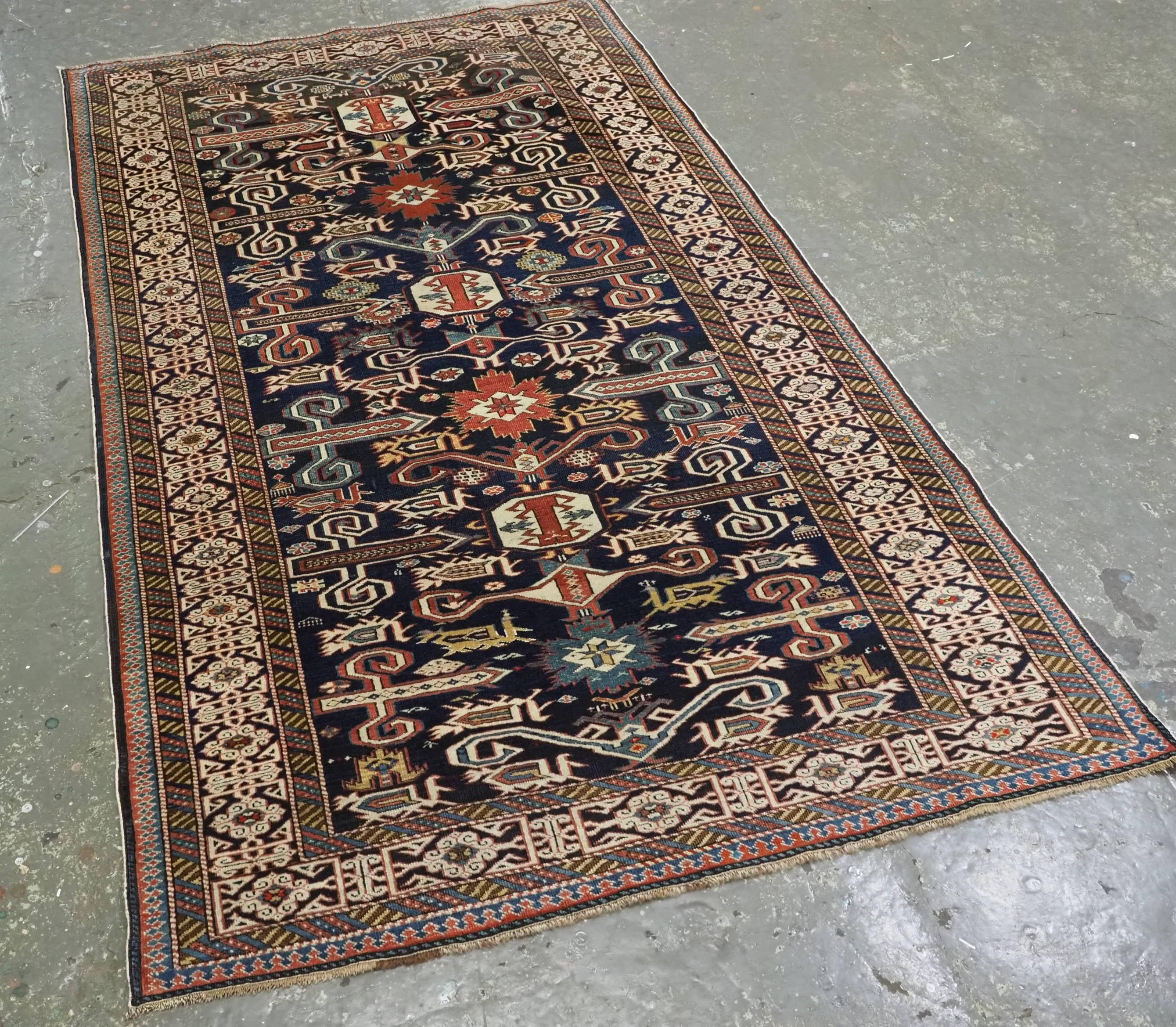 
Size: 5ft 9in x 3ft 6in (175 x 107cm).

Antique Caucasian Kuba region Perepedil rug with an indigo blue ground and classic Kufic border.

Circa 1880.

This rug is an excellent example of a Perepedil with a very well drawn field. The colour range is