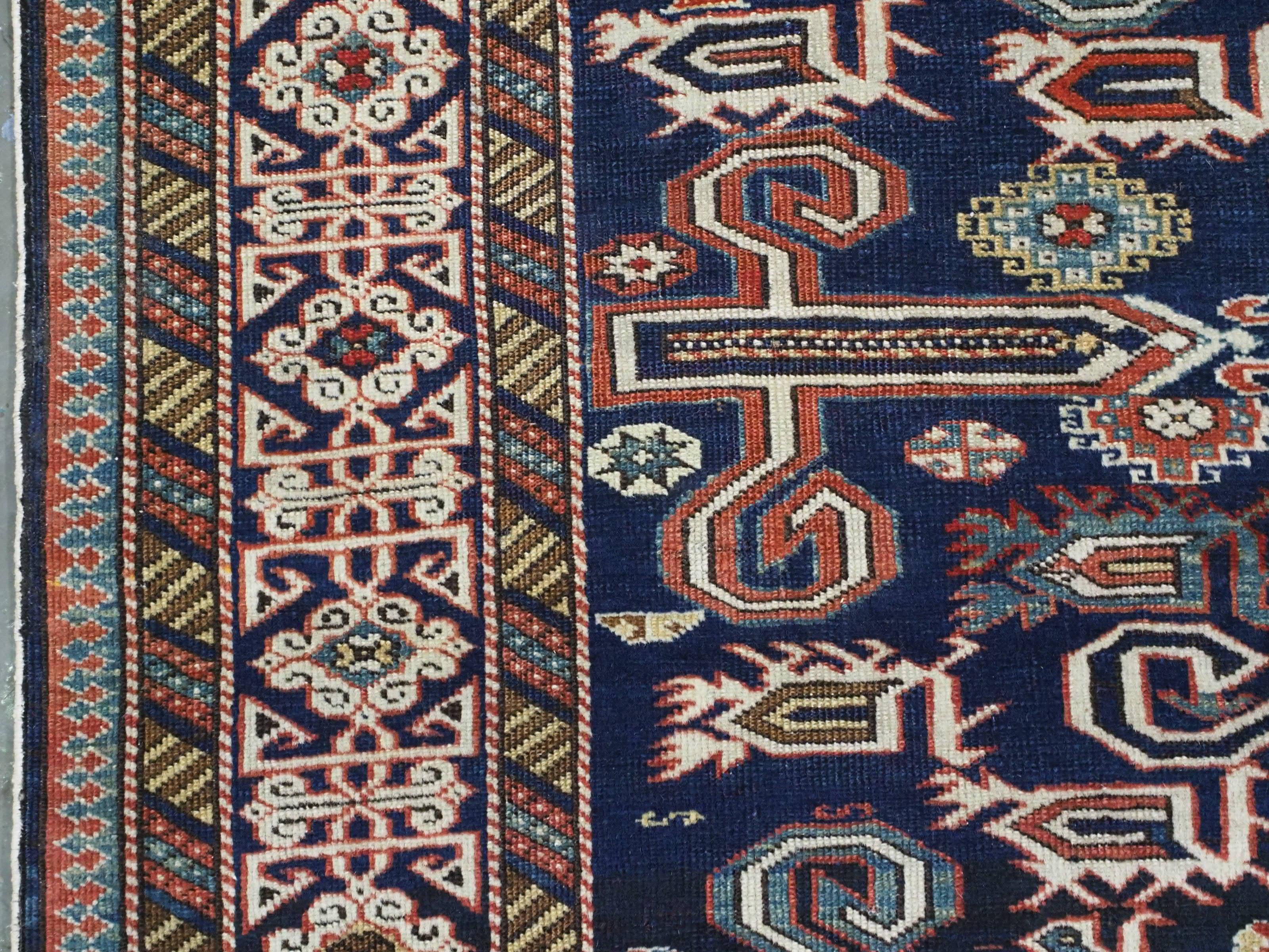 Antique Caucasian Kuba region Perepedil rug with an indigo blue ground. For Sale 2