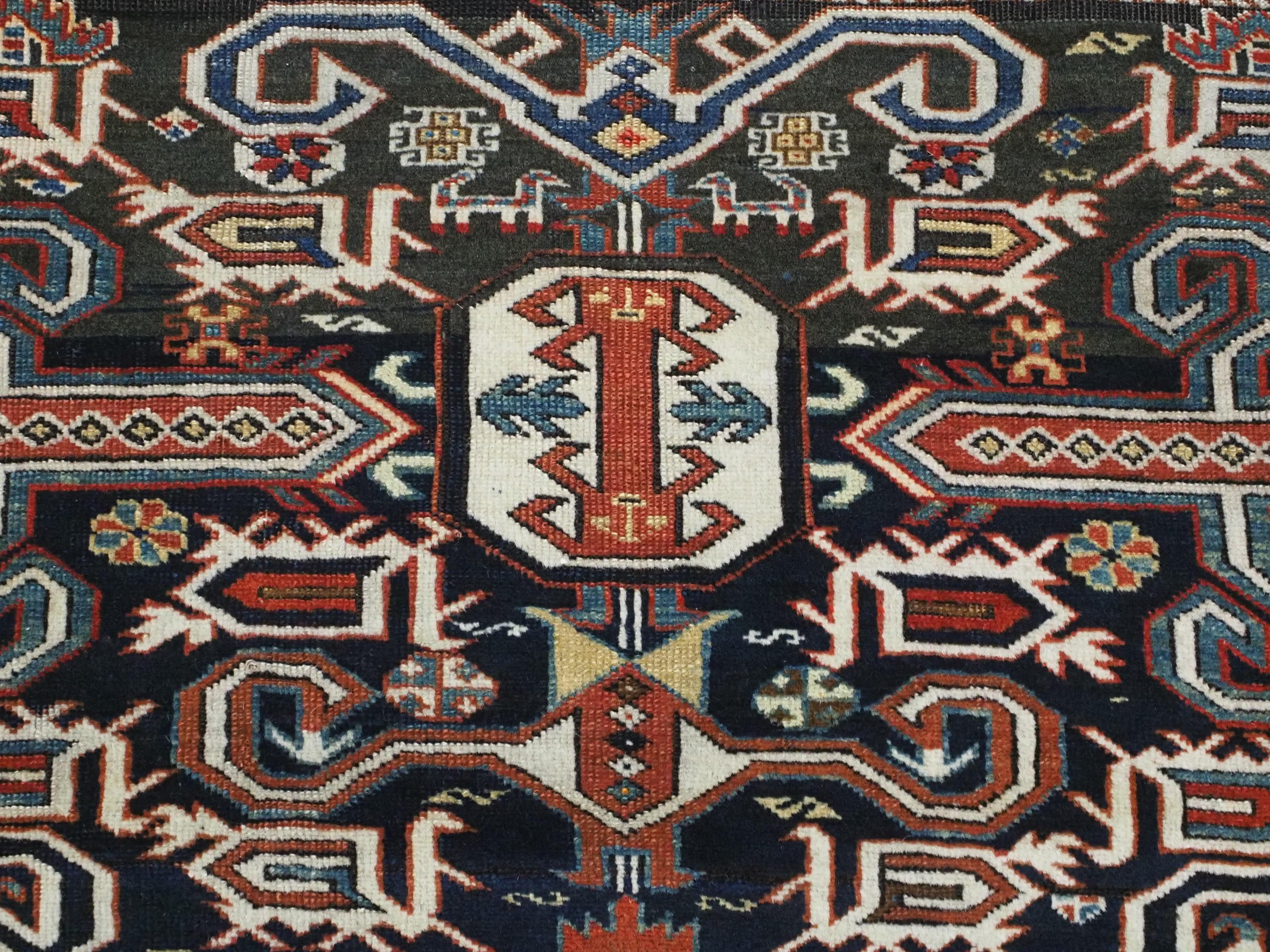 Antique Caucasian Kuba region Perepedil rug with an indigo blue ground. For Sale 3