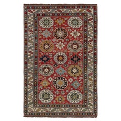 Tapis Kuba caucasien ancien avec médaillons floraux colorés, de Rug & Kilim