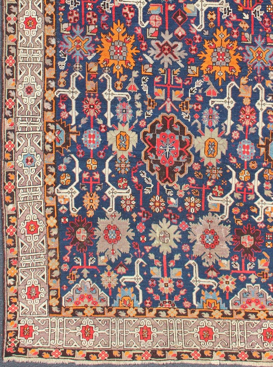 Kuba antique rug in colorful tones, rug 19-0807, country of origin / type: Caucasus / Kuba, circa 1880

This colorful Kuba carpet from the Caucasus region features a vibrant color palette and exquisitely intricate geometric designs throughout the