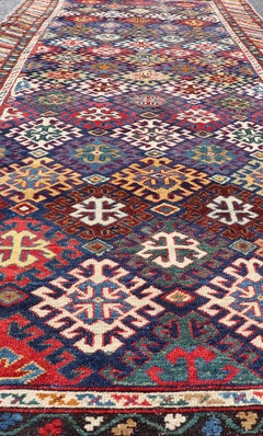 Antique Caucasian Kuba Runner With Tribal Design & All-Over Motifs 4' x 10'6