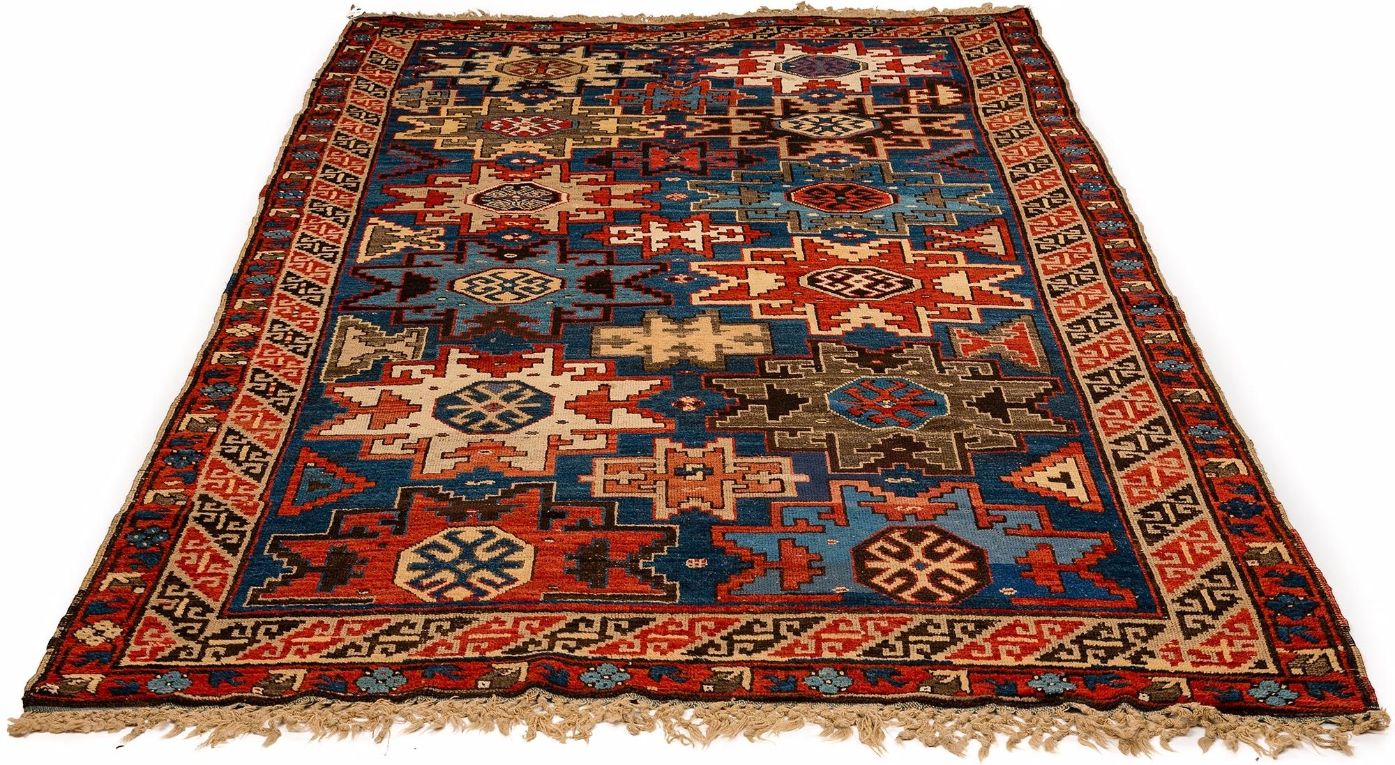 Tribal Antique Caucasian Lesghi Star Wool Hand Knotted Rug Woven by the Kurds For Sale