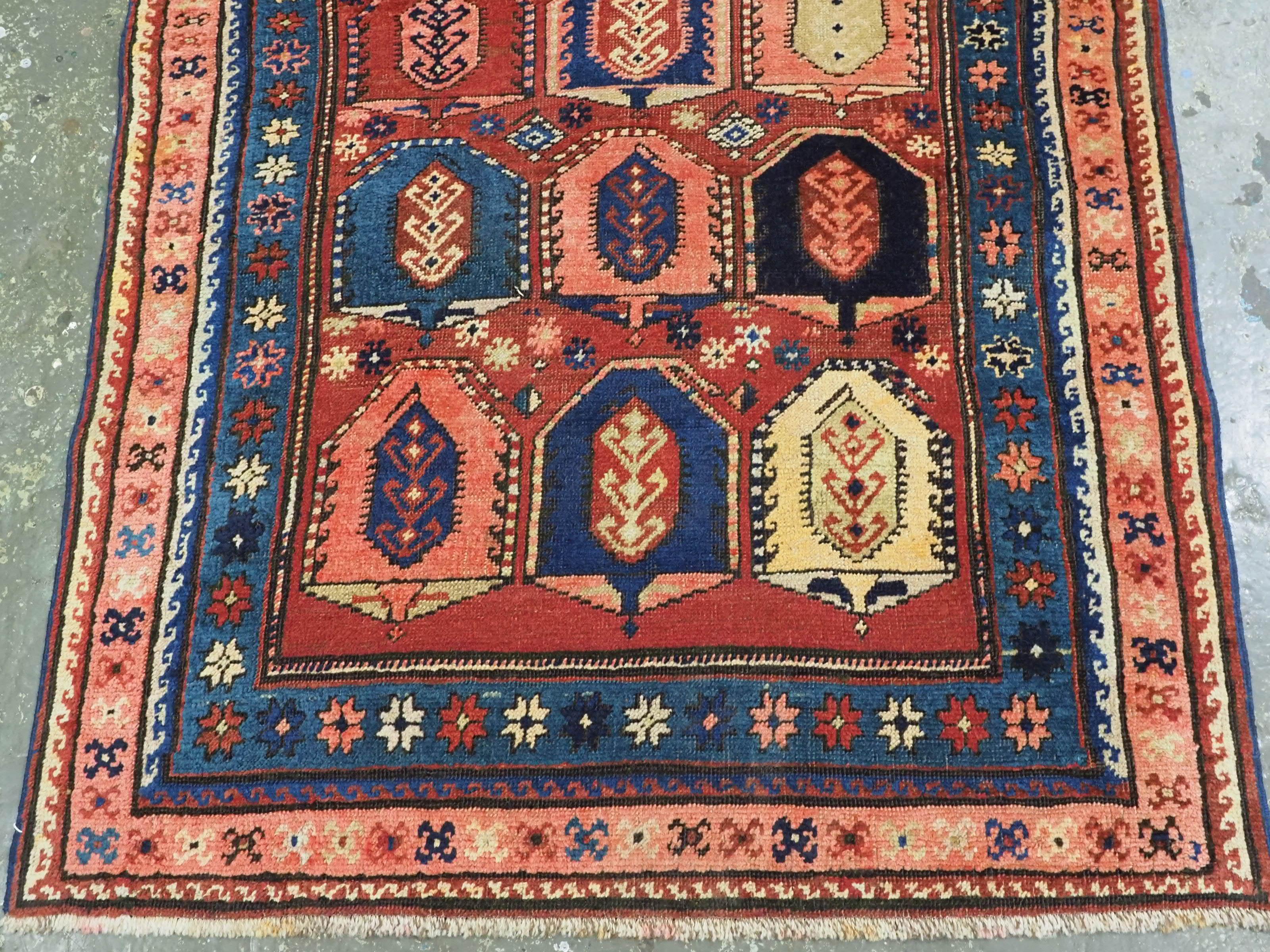 Antique Caucasian long rug with all over boteh design.  Circa 1900. For Sale 1