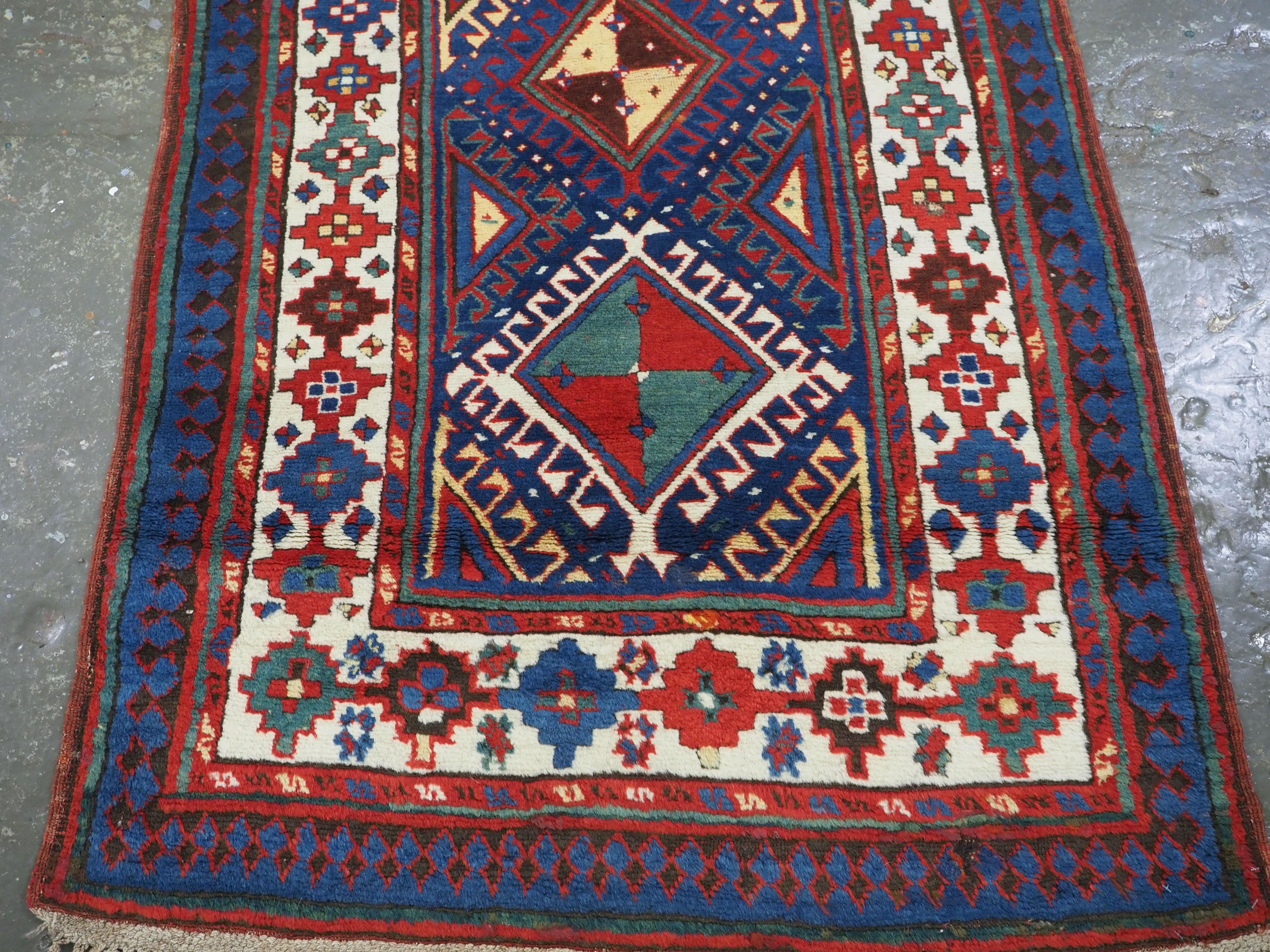 Late 19th Century Antique Caucasian Moghan Kazak long rug / runner, circa 1880. For Sale