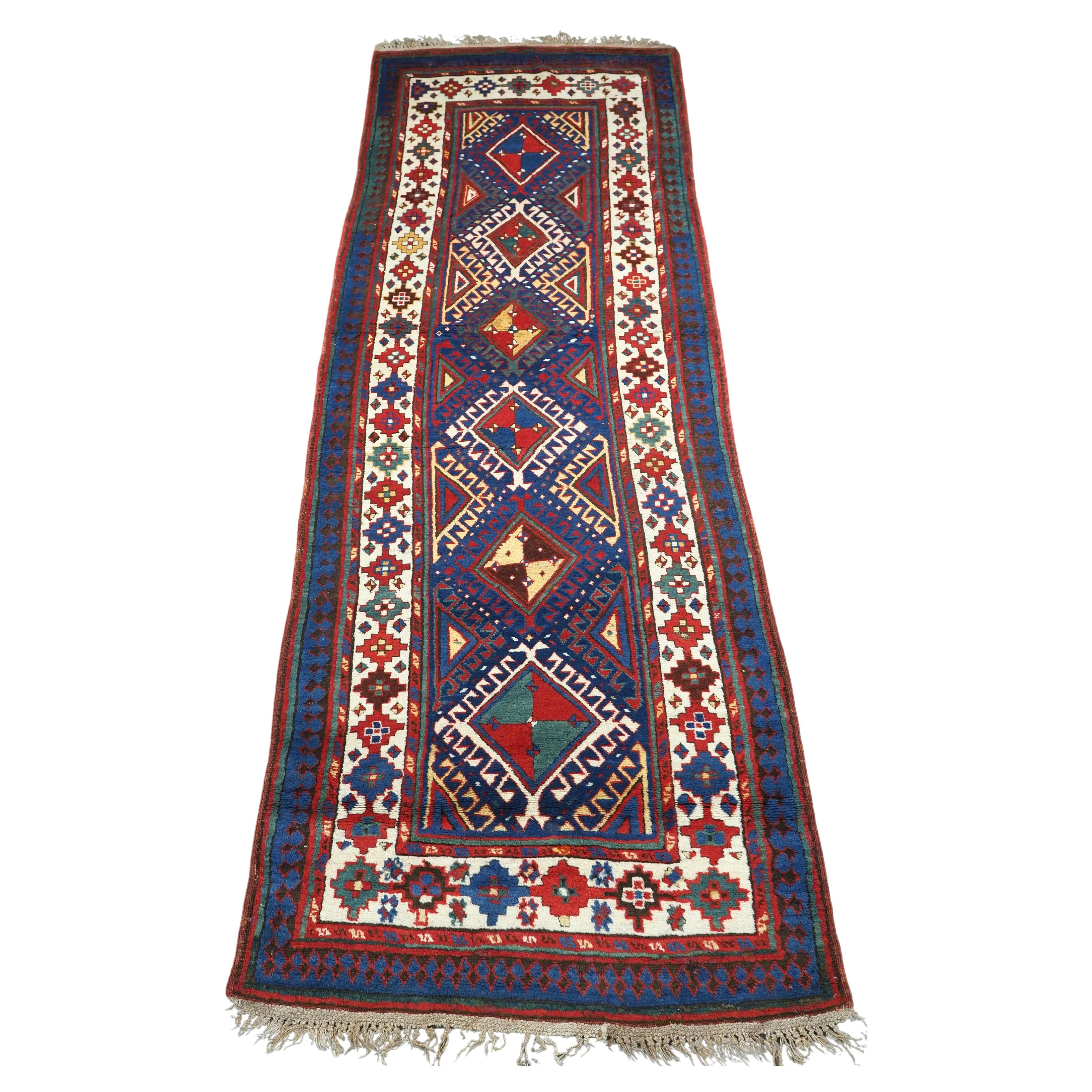 Antique Caucasian Moghan Kazak long rug / runner, circa 1880.