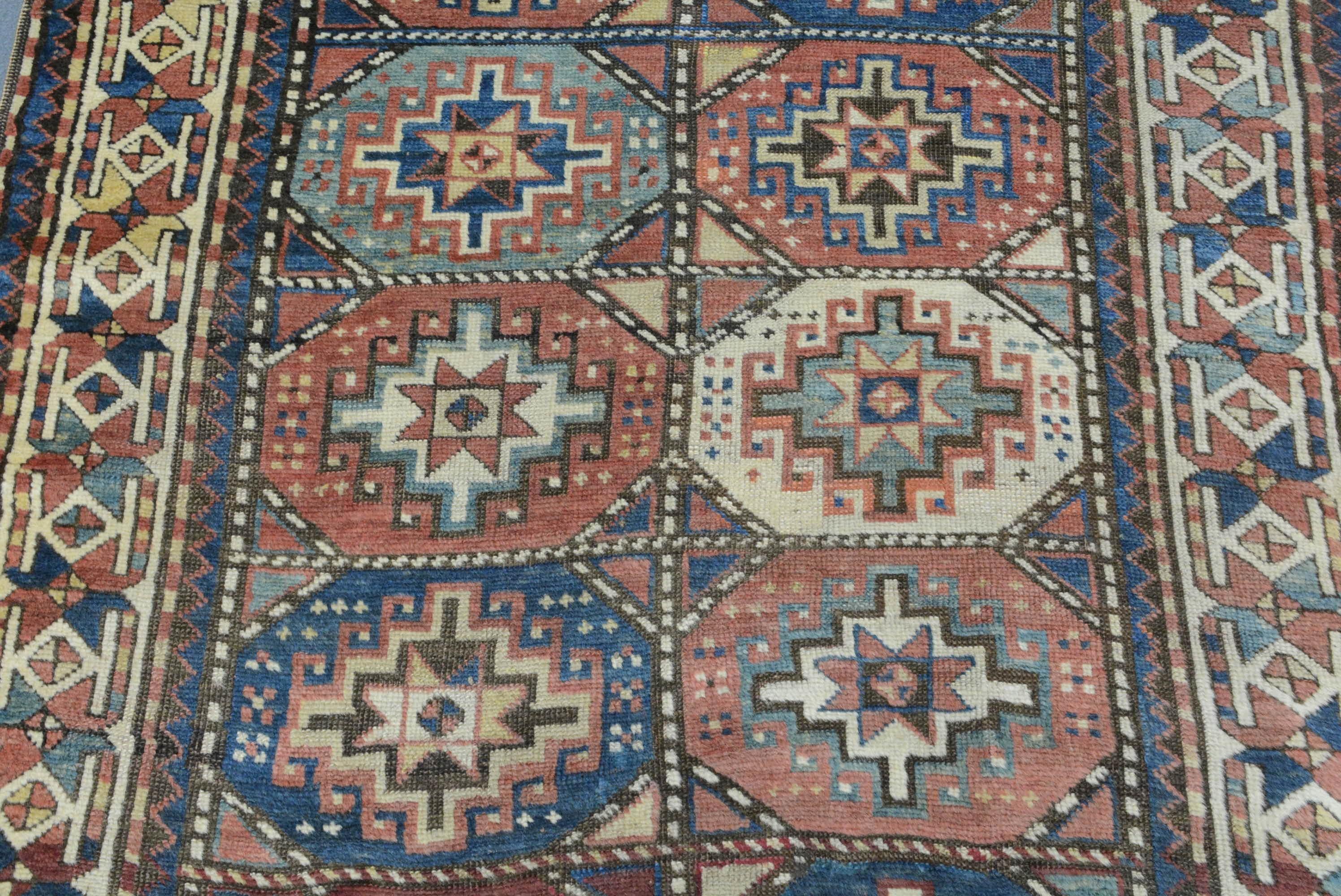 Tribal Antique Caucasian Moghan Kazak Rug For Sale