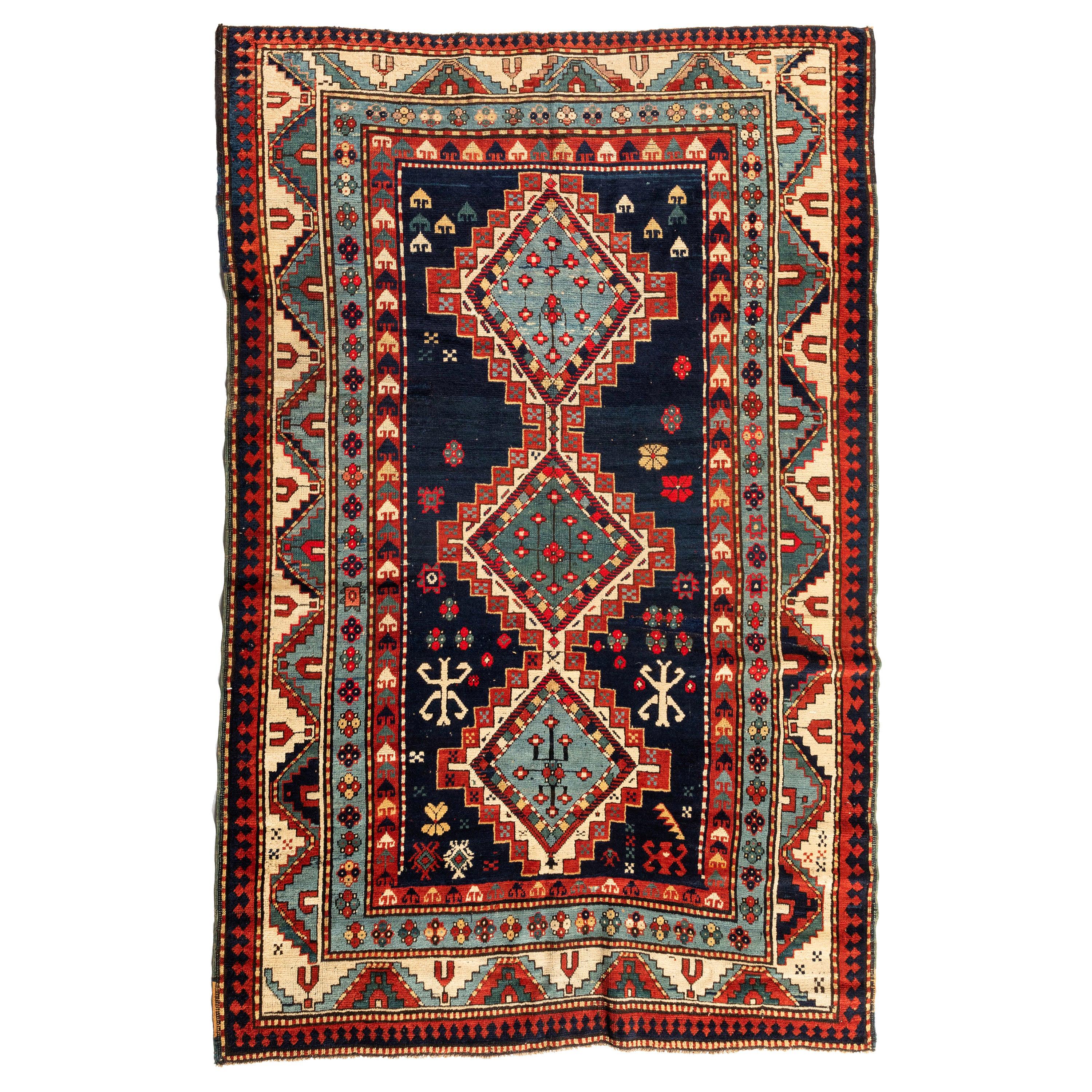 Antiker kaukasischer kastanienblauer Kazak-Teppich, ca. 1900-1910er Jahre